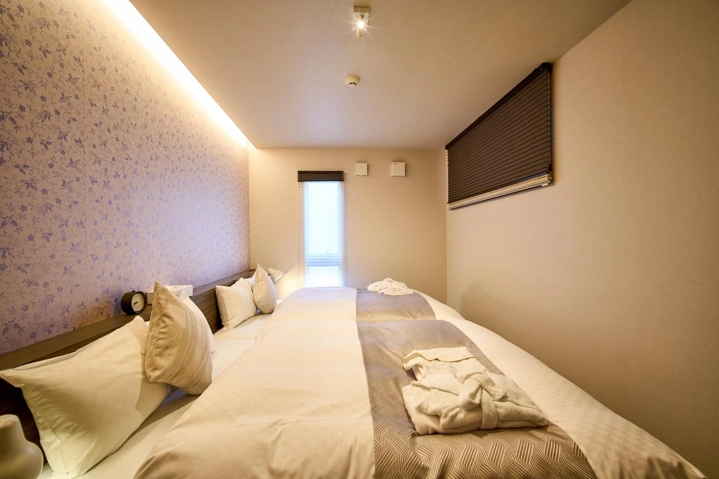 Bed in HOTEL MASTAY jingumichi