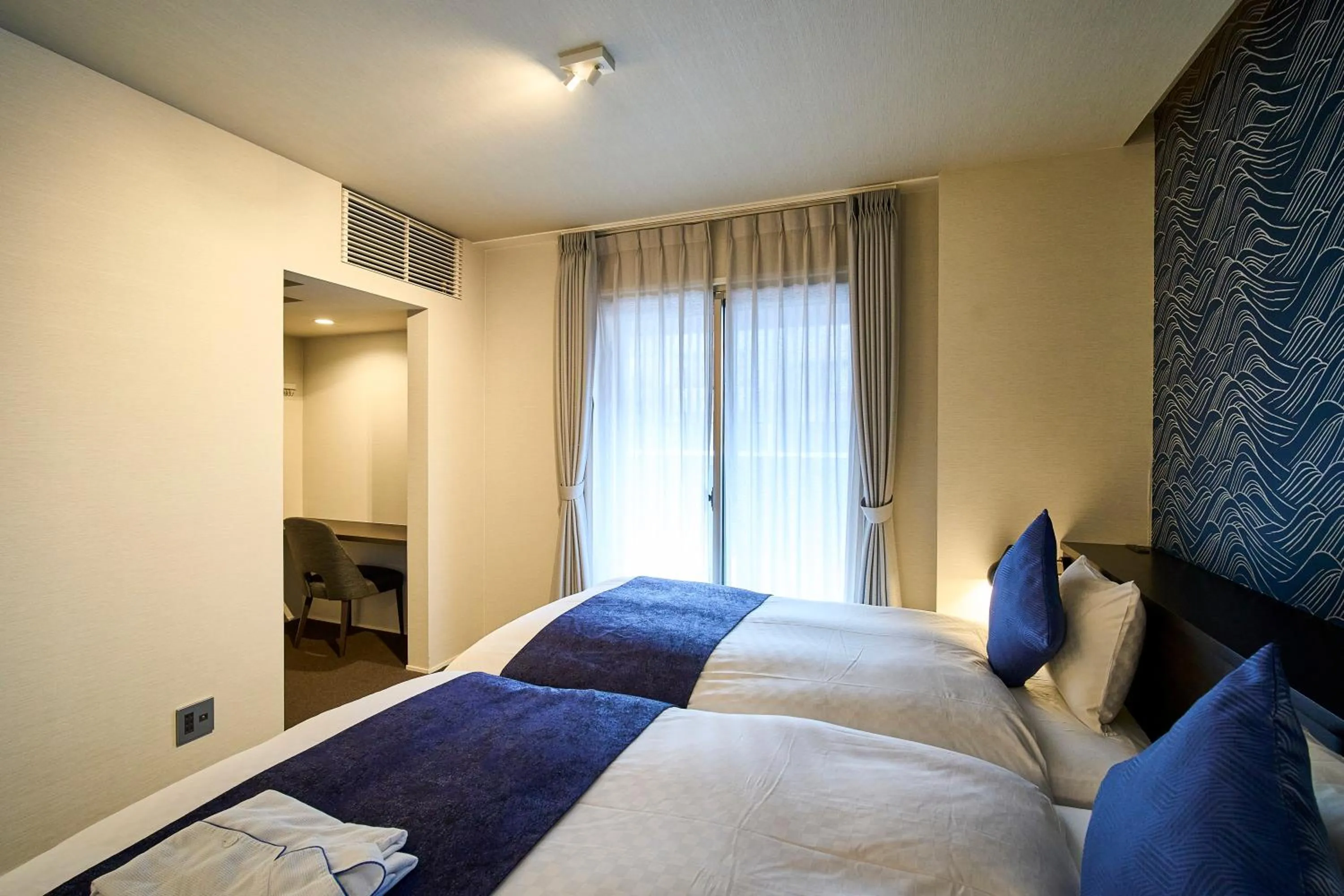 Bed in HOTEL MASTAY jingumichi