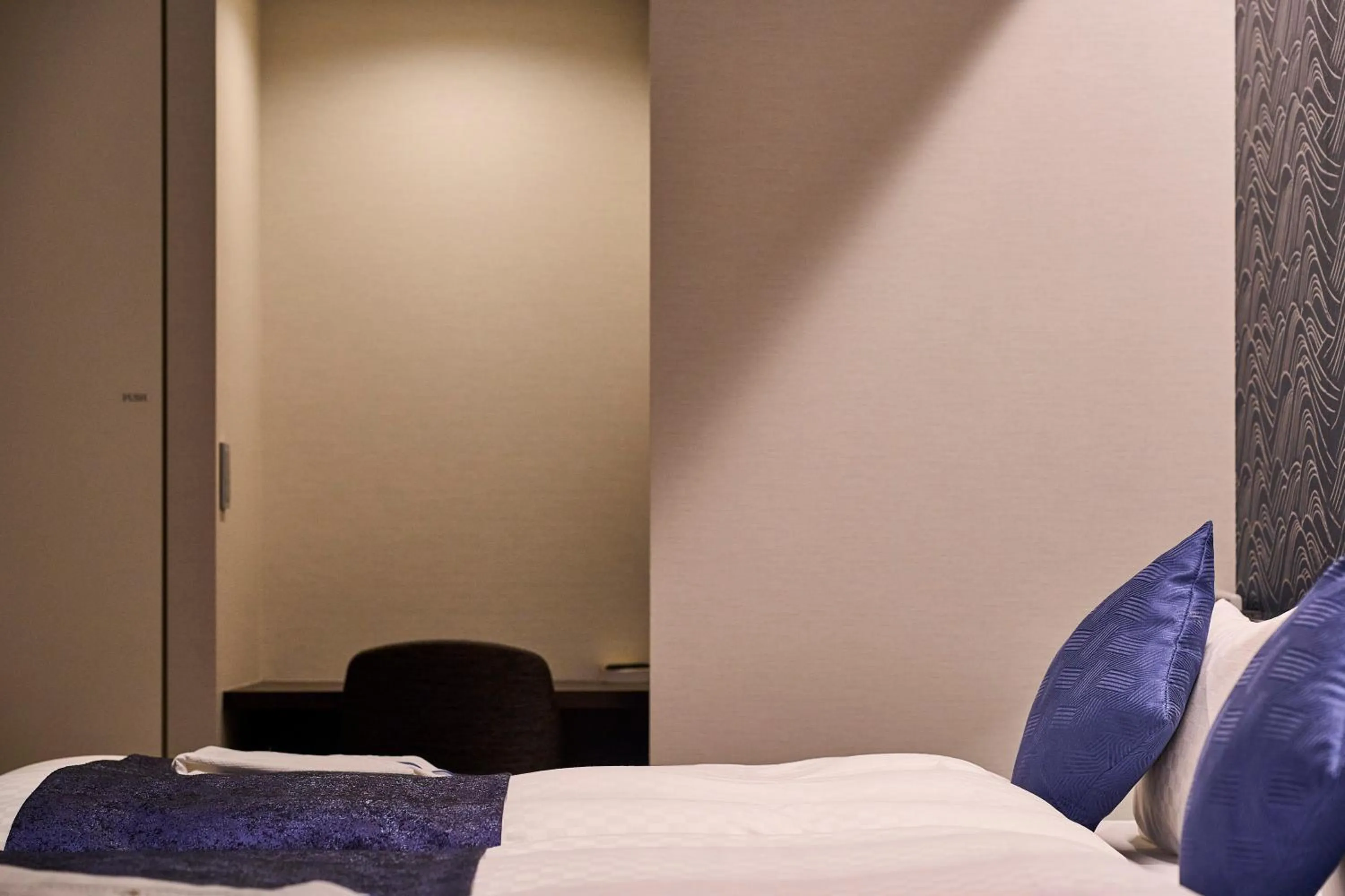 Bed in HOTEL MASTAY jingumichi