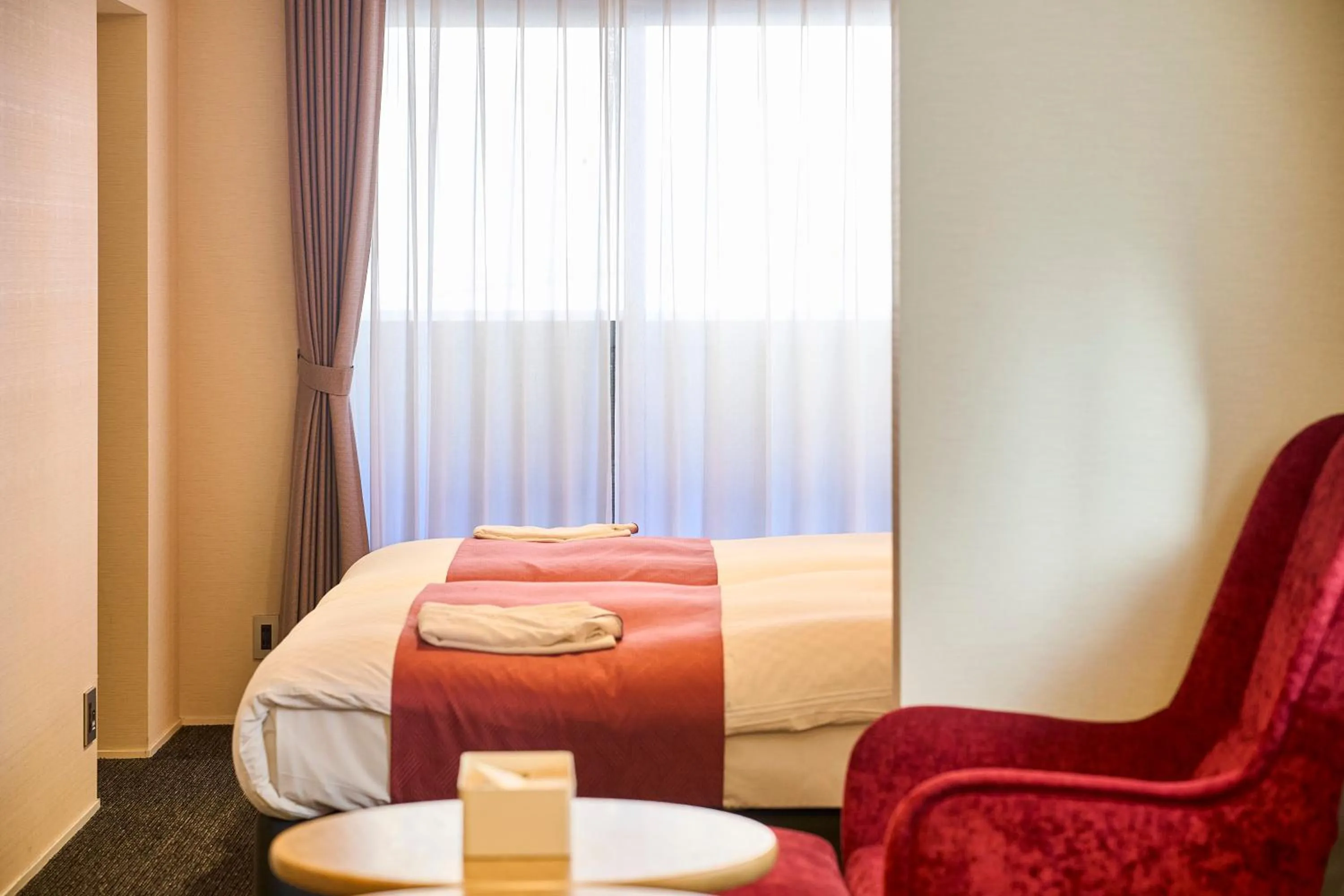 Bed in HOTEL MASTAY jingumichi