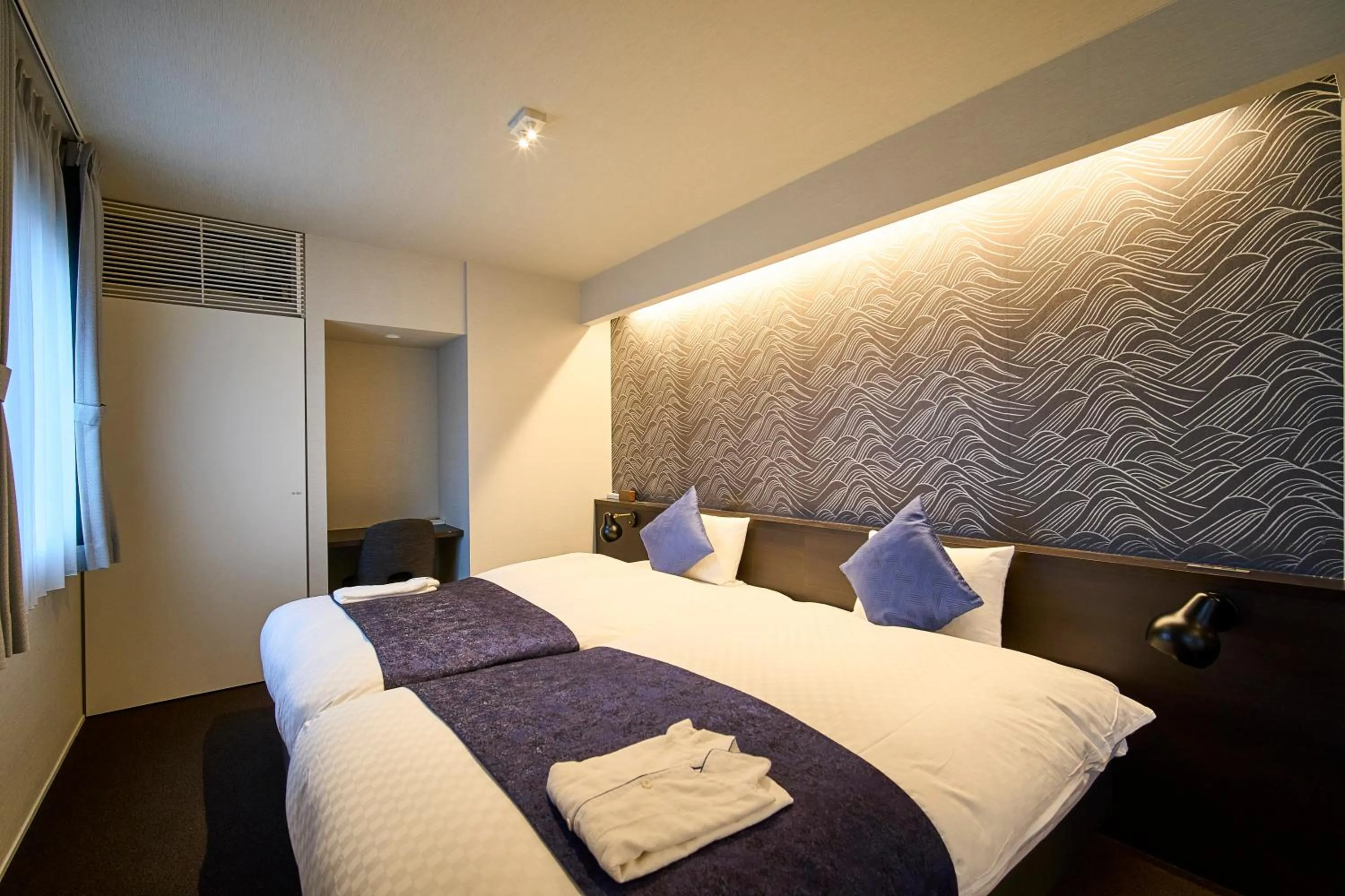 Bed in HOTEL MASTAY jingumichi