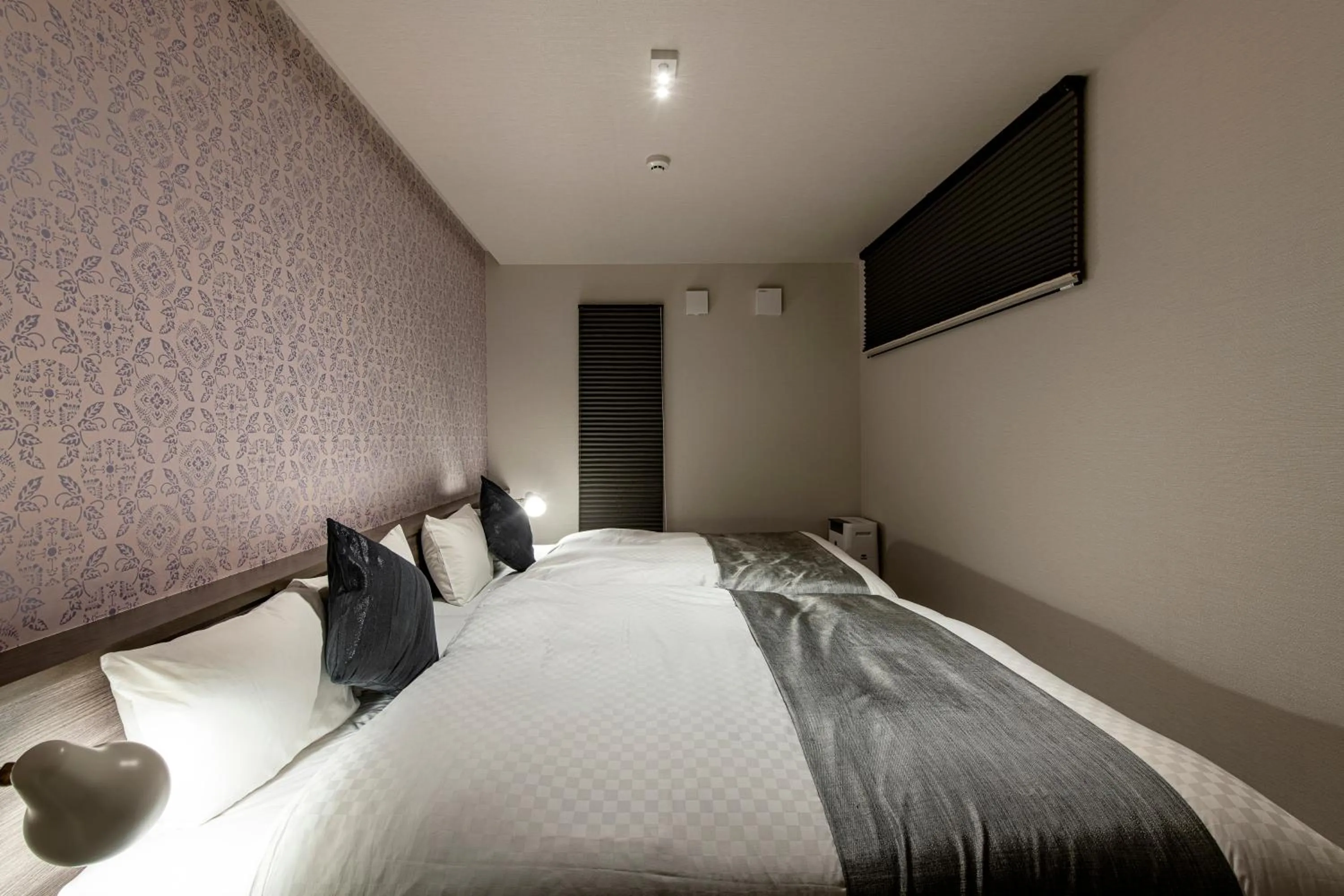 Bed in HOTEL MASTAY jingumichi