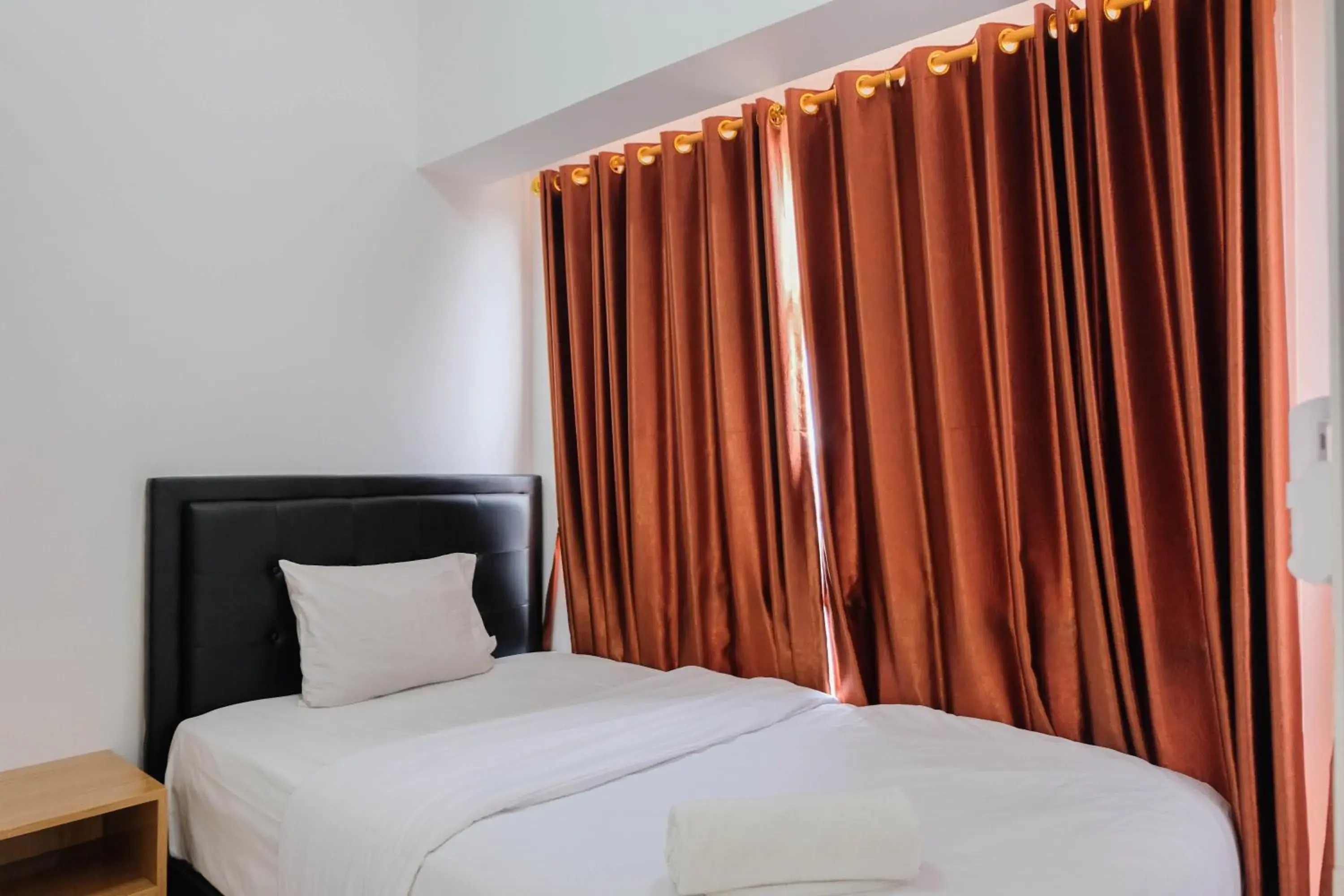 Bedroom, Bed in Comfortable 2BR Apartment at M-Town Residence By Travelio Bedroom, Bed in Comfortable 2BR Apartment at M-Town Residence By Travelio