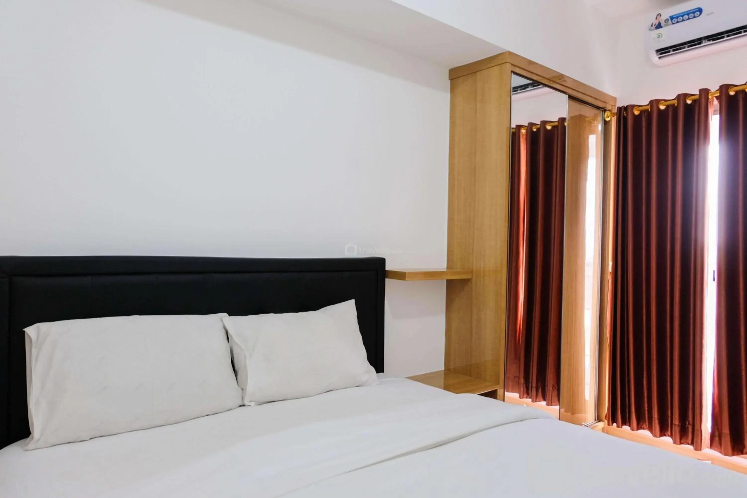 Bed in Comfortable 2BR Apartment at M-Town Residence By Travelio Bed in Comfortable 2BR Apartment at M-Town Residence By Travelio
