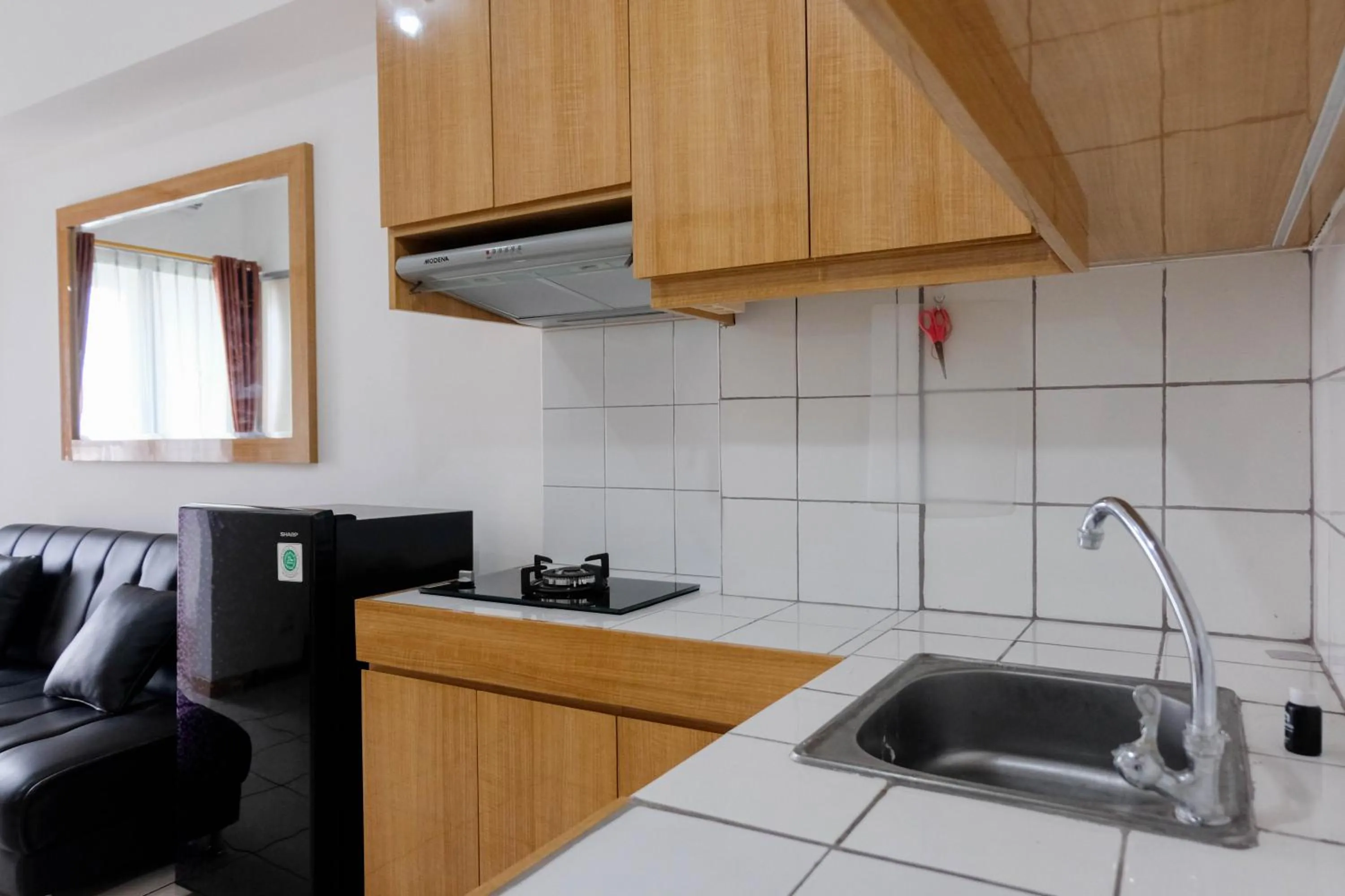 Comfortable 2BR Apartment at M-Town Residence By Travelio