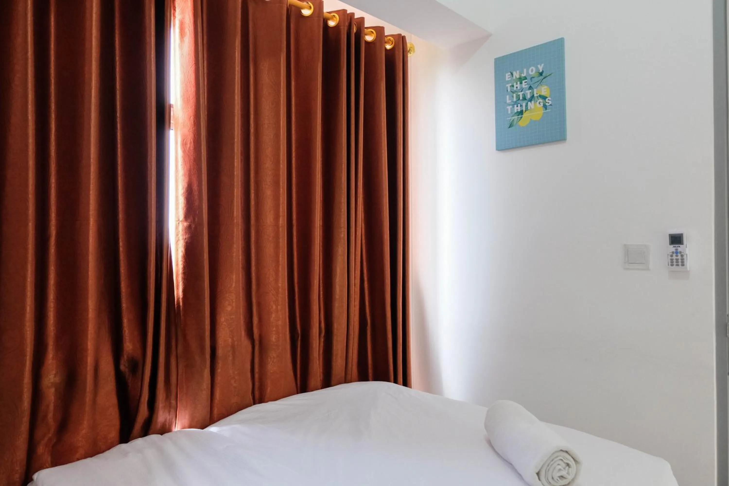 Bed in Comfortable 2BR Apartment at M-Town Residence By Travelio