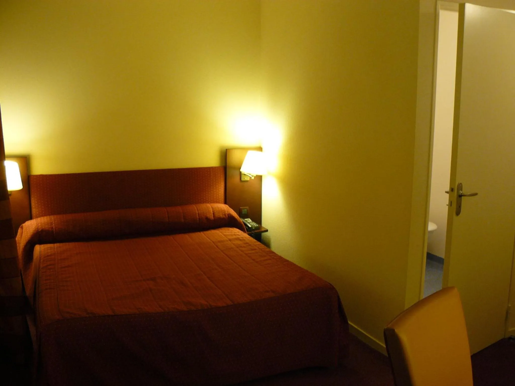 Bed in Le Parc Des Fees Hôtel Retaurant & Spa