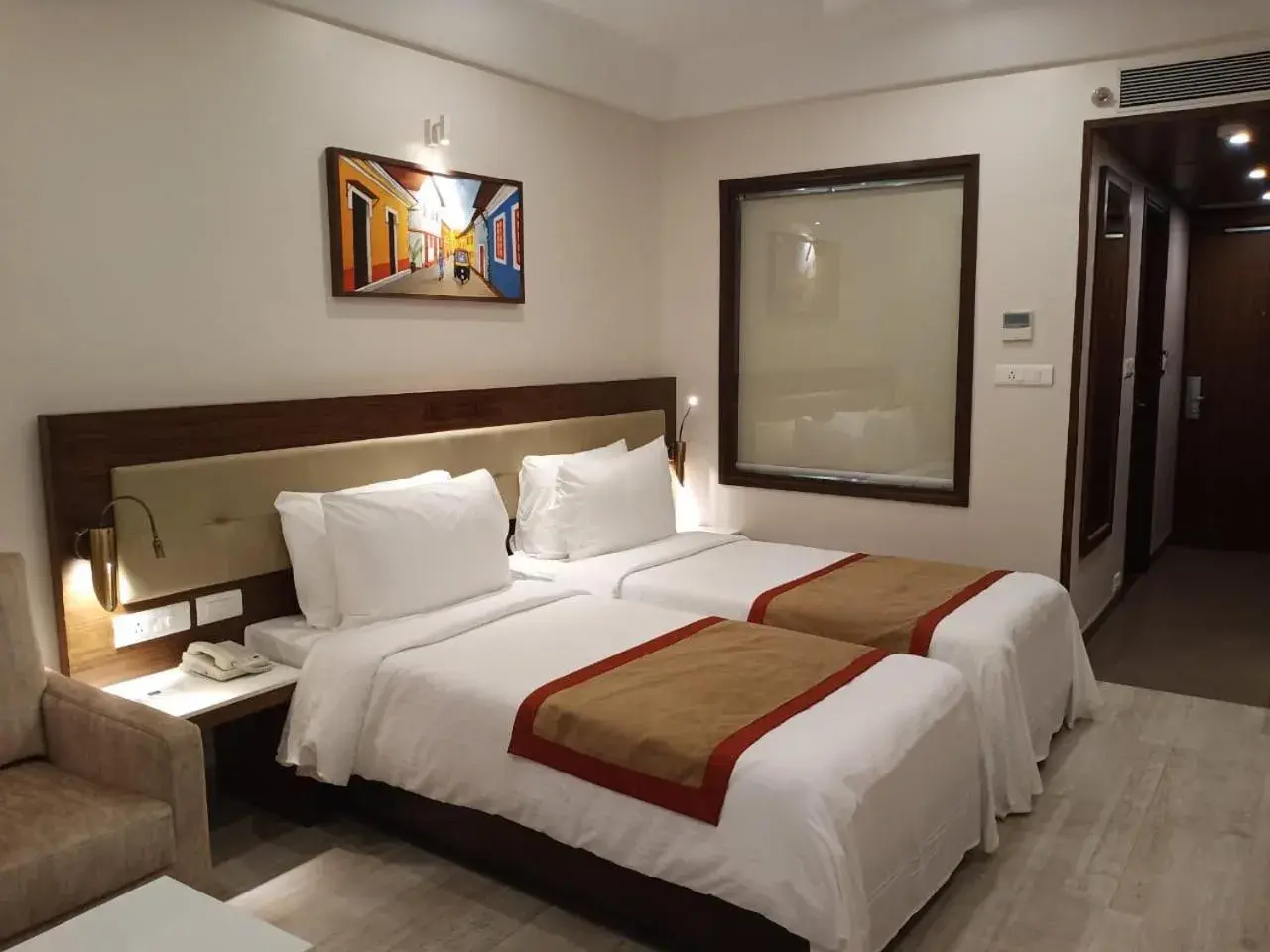 Deluxe Twin Room with Balcony in Sobit Sarovar Portico Deluxe Twin Room with Balcony in Sobit Sarovar Portico