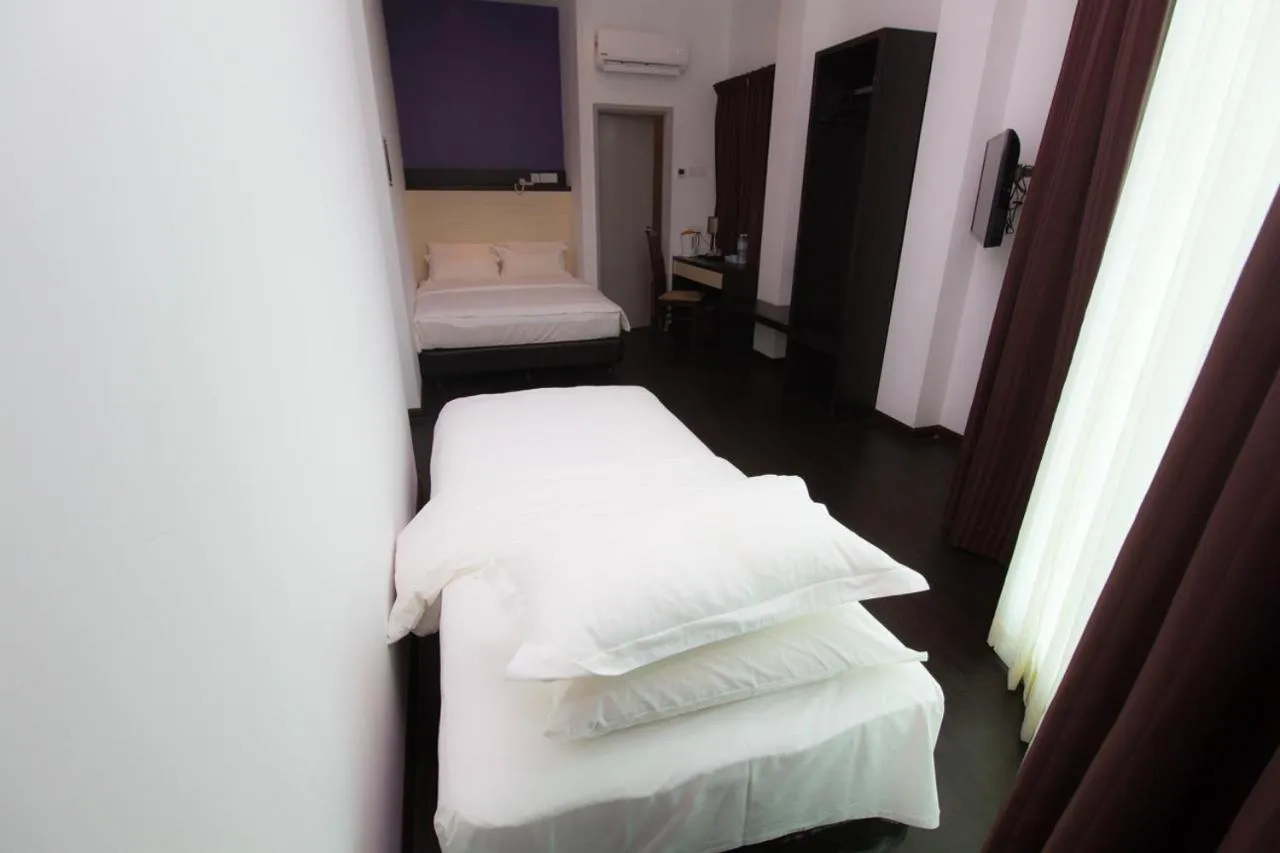 Bed in Aurora Boutique Hotel