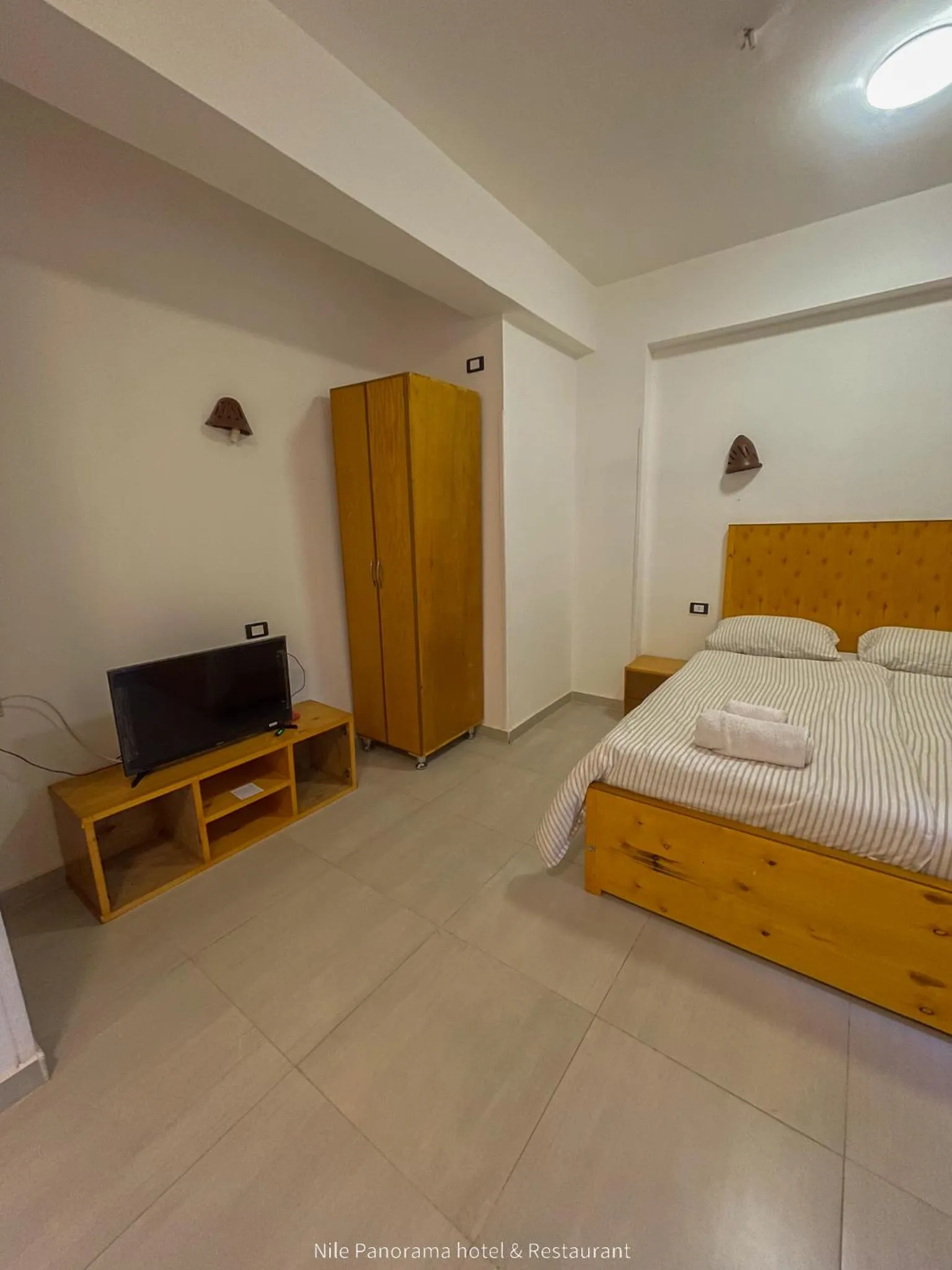 Photo of the whole room, Bed in Nile Panorama Hotel & Restaurant
