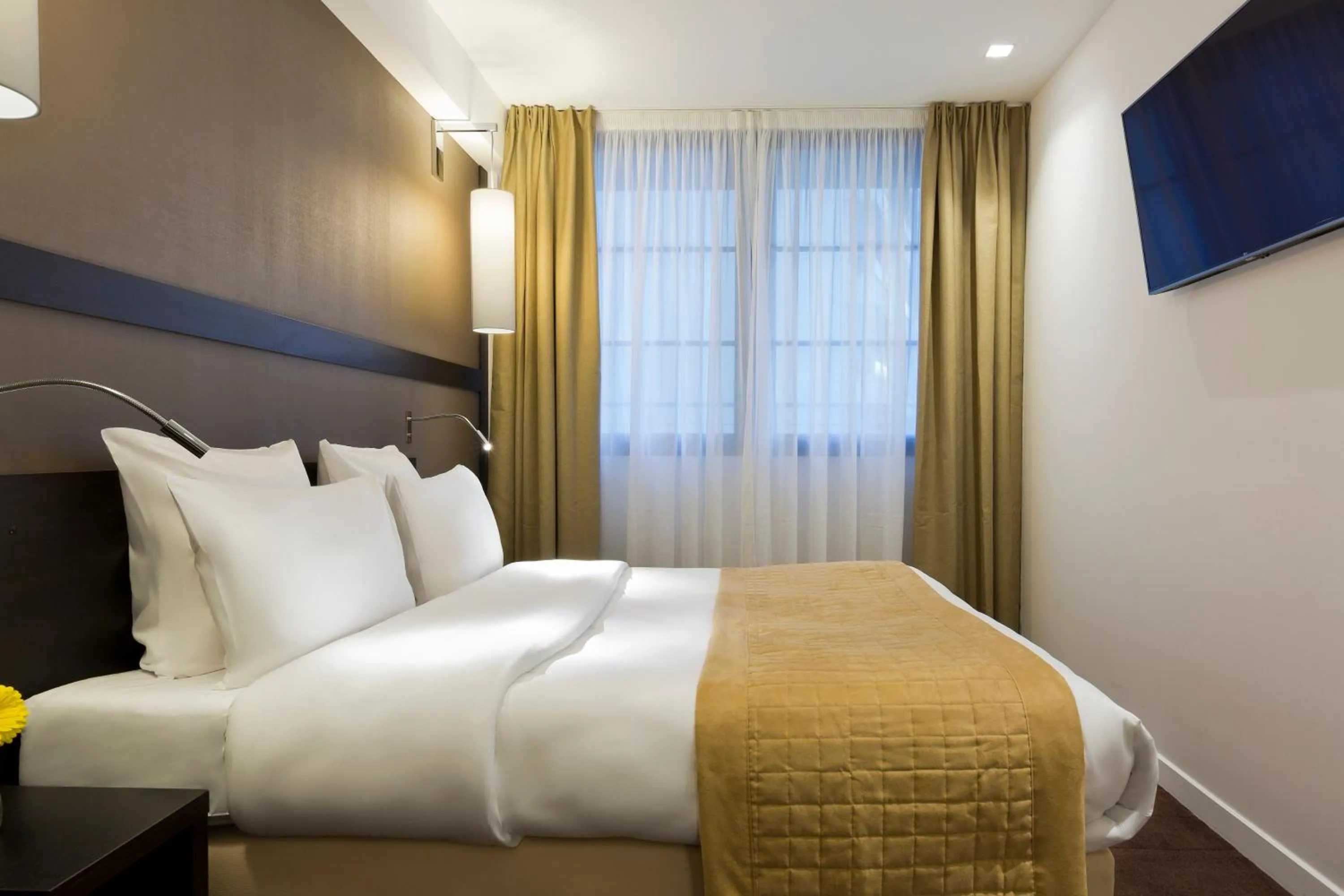 Bed in Simon's Boutique Hôtel