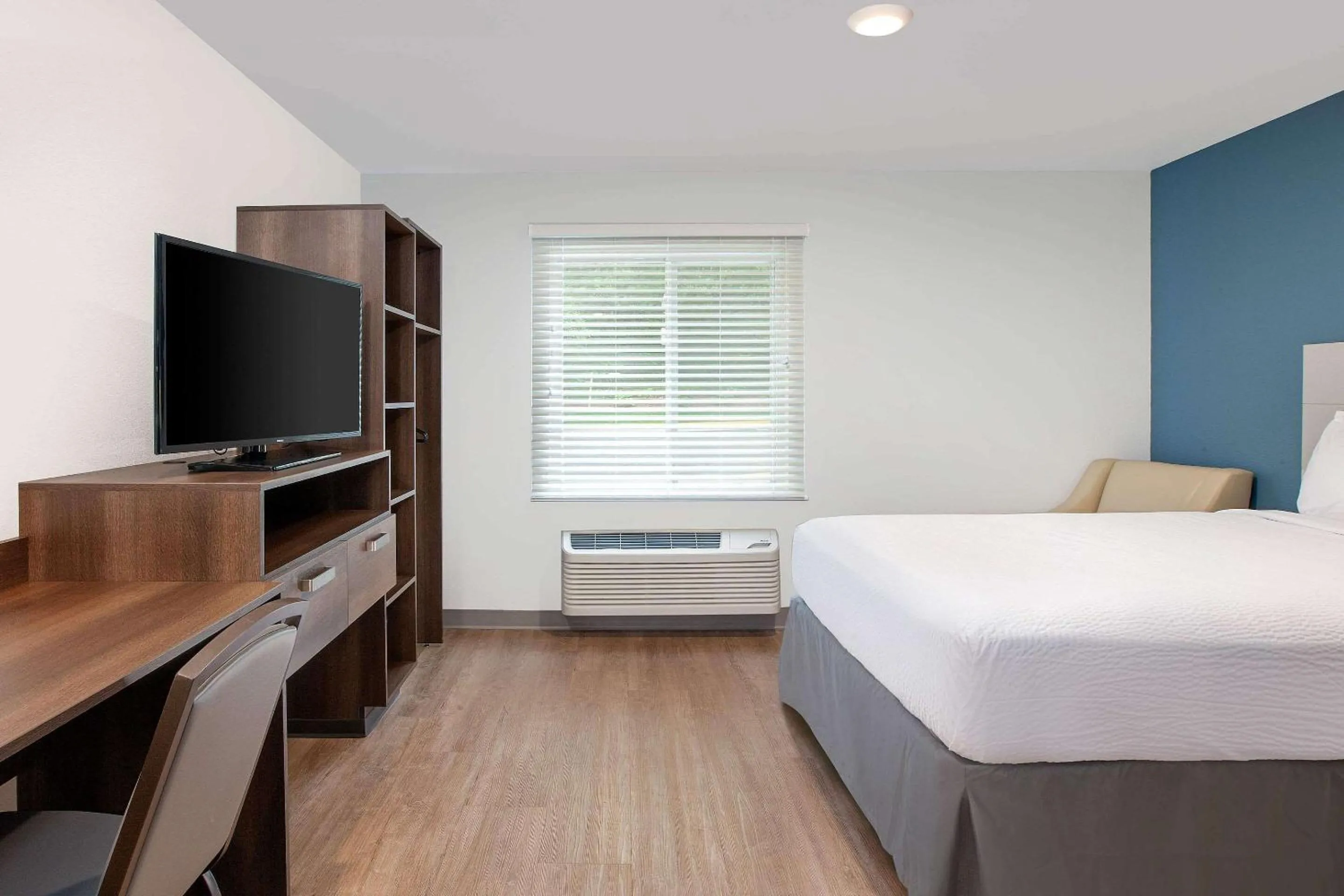 Photo of the whole room, Bed in WoodSpring Suites Quantico