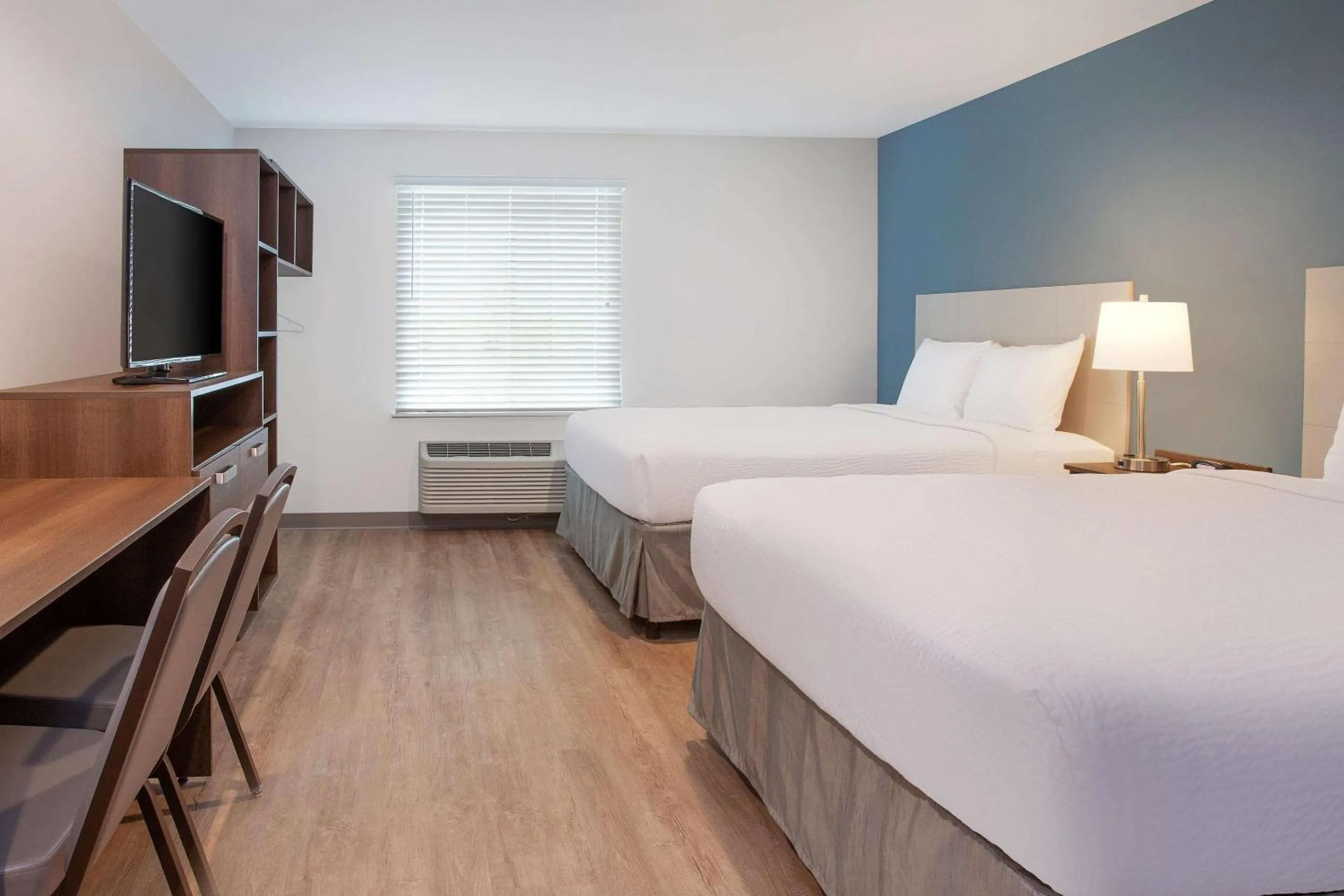 Photo of the whole room, Bed in WoodSpring Suites Quantico