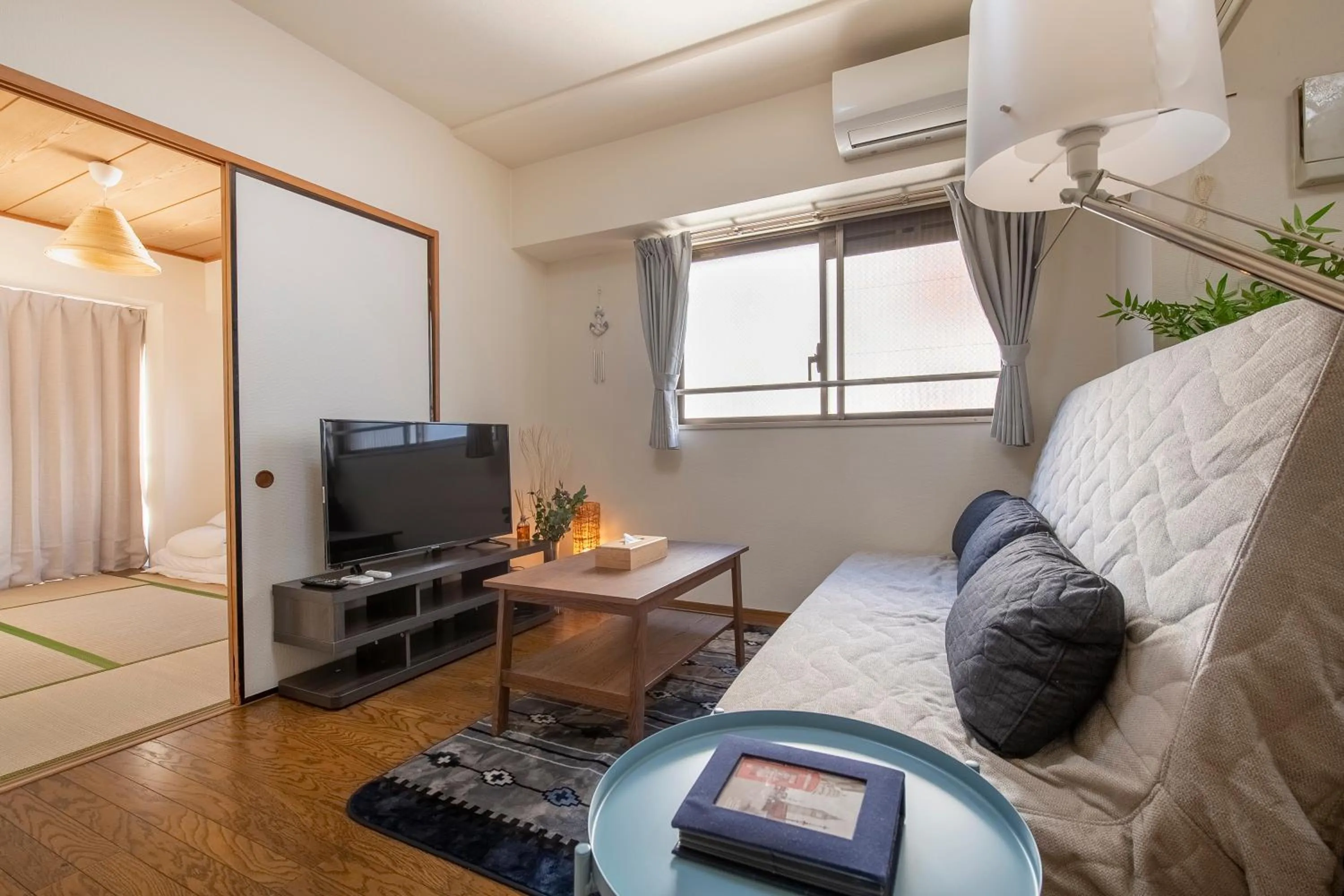 Bed in Uhome Akihabara Apartment 3