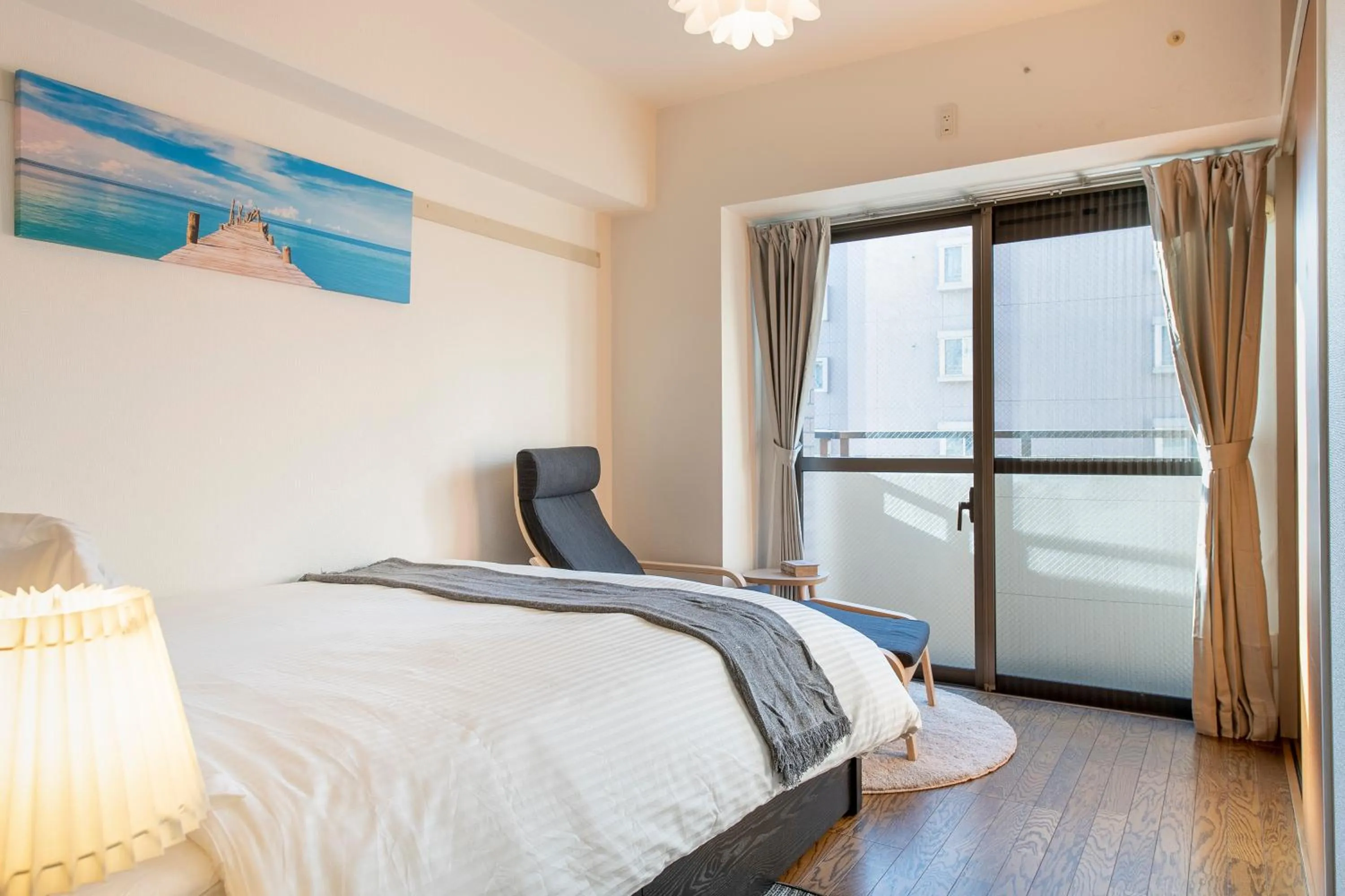 Bed in Uhome Akihabara Apartment 3