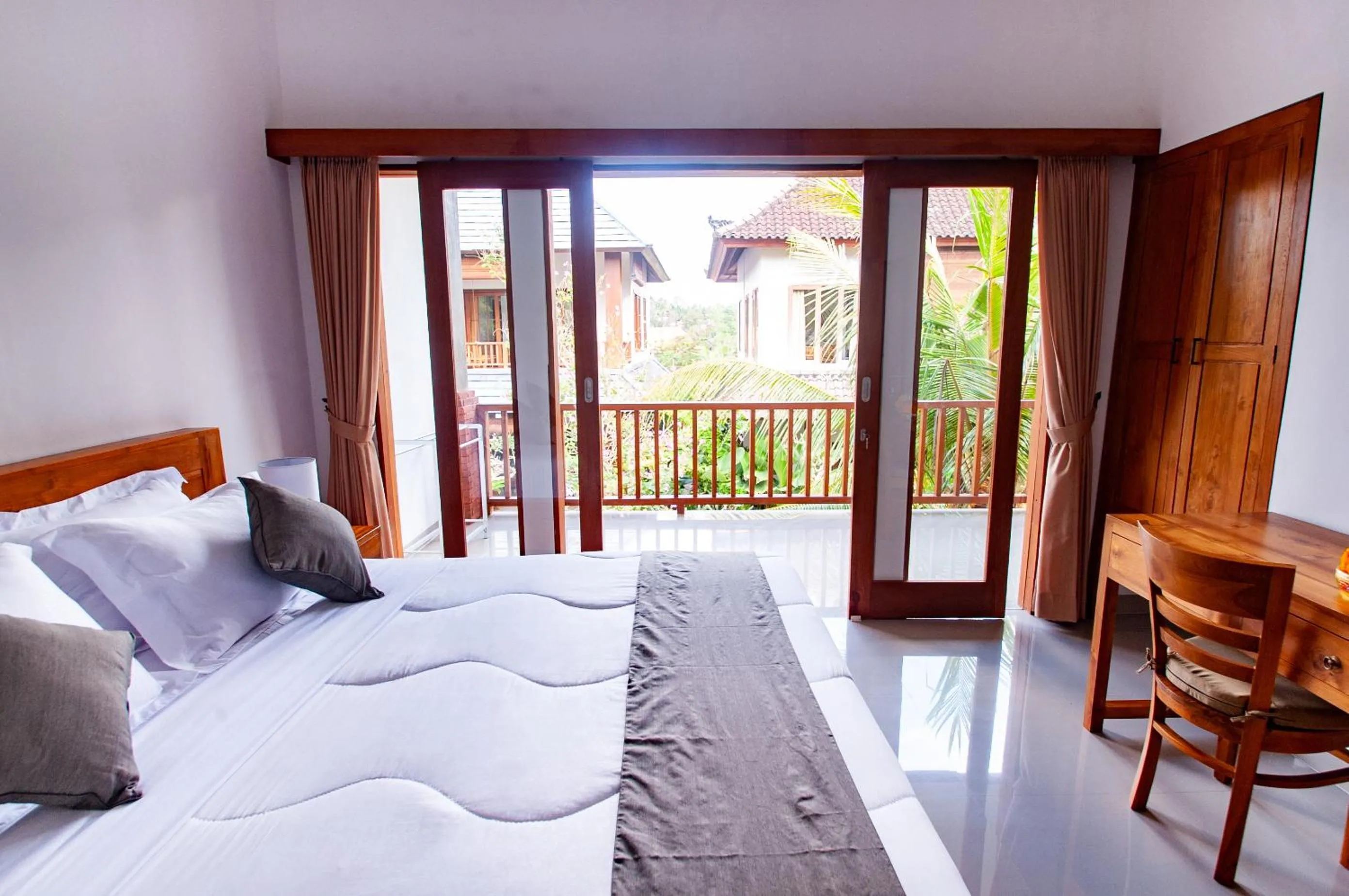 Bed in Flamboyant Villa Ubud