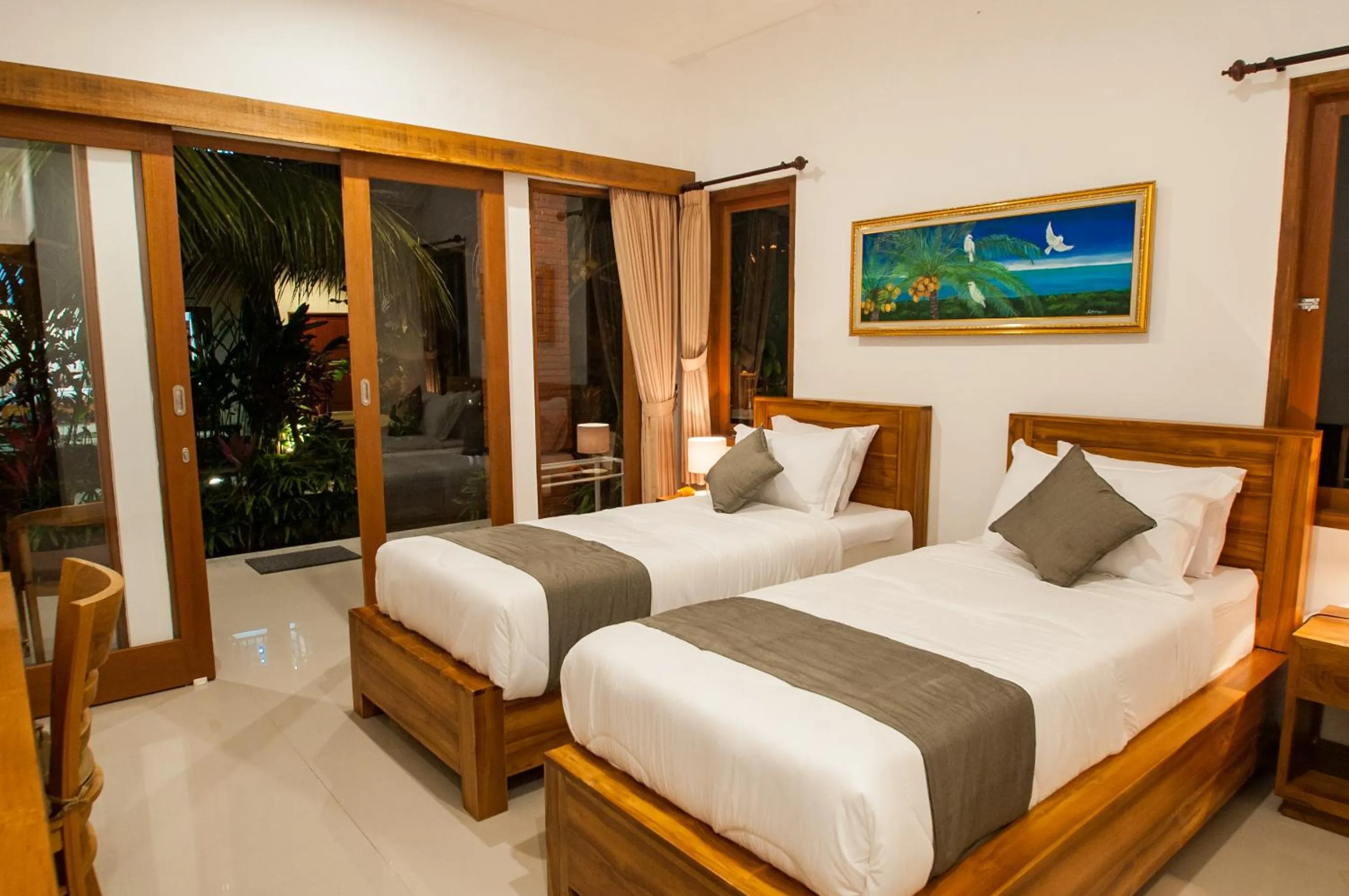 Bed in Flamboyant Villa Ubud