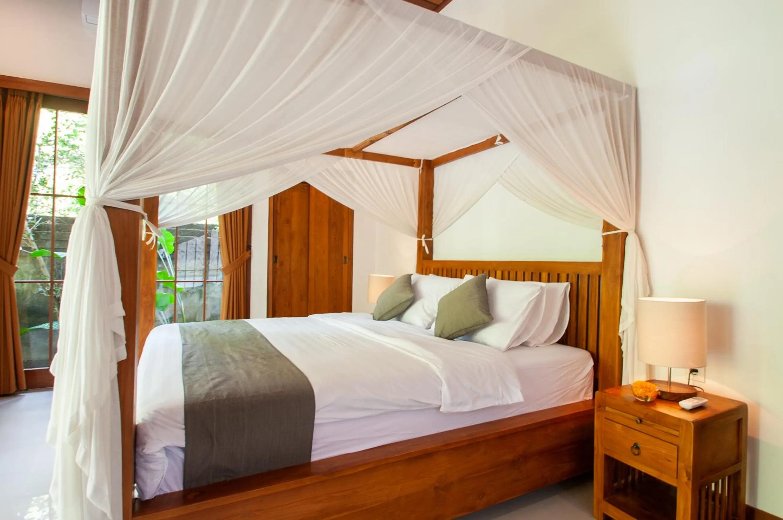 Bed in Flamboyant Villa Ubud
