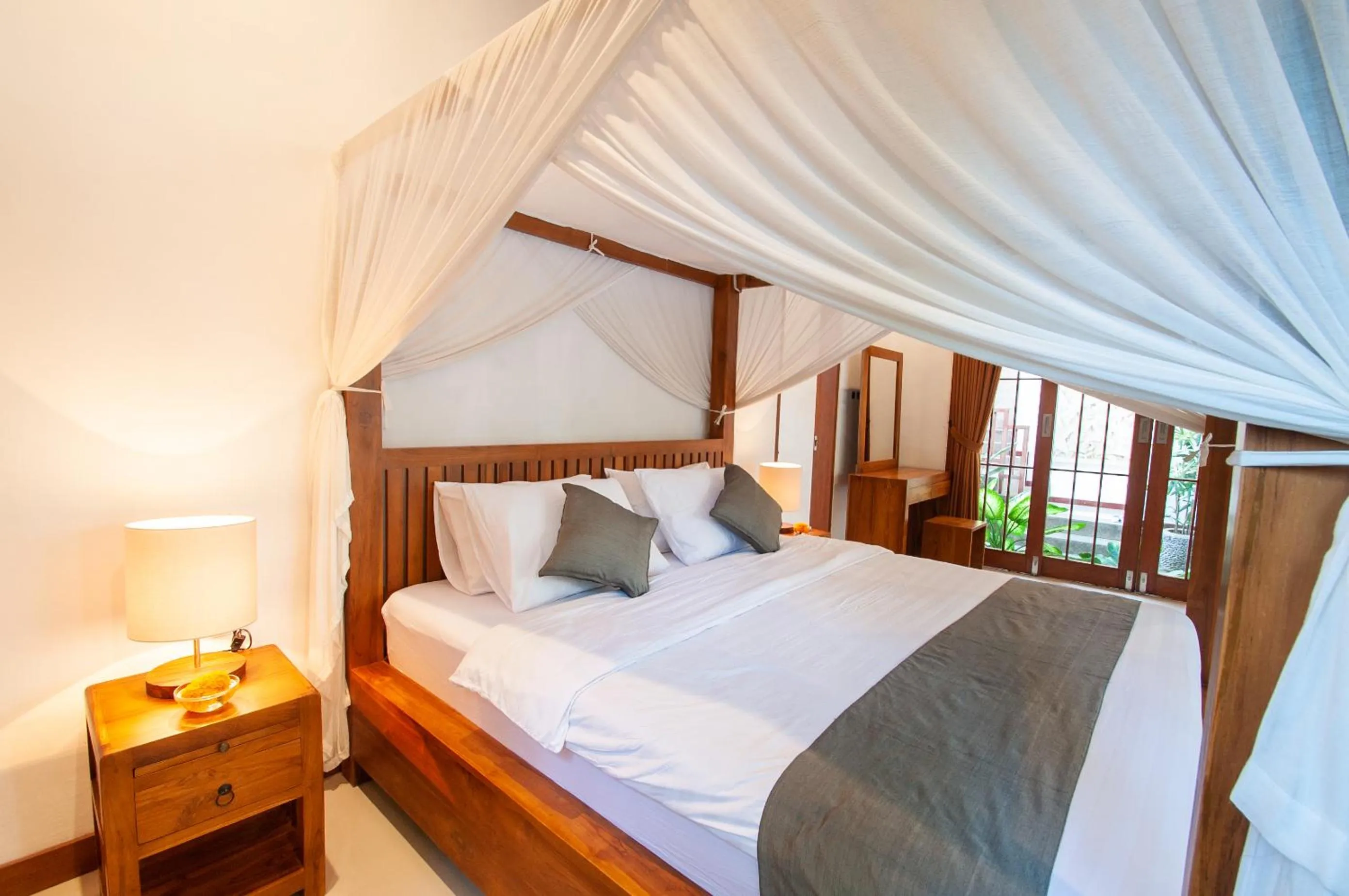 Bed in Flamboyant Villa Ubud