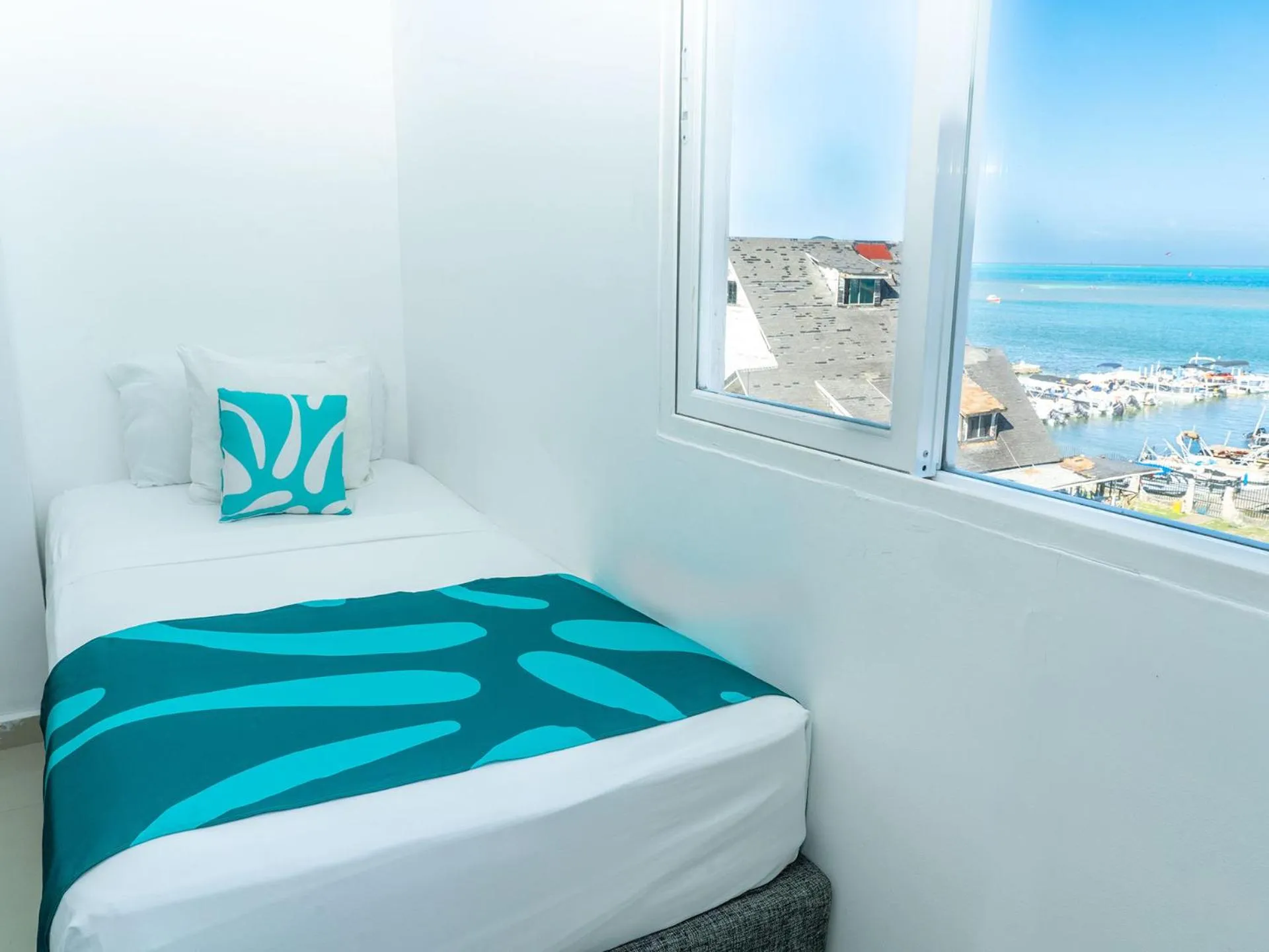 Bed in Hotel Caribbean Coral