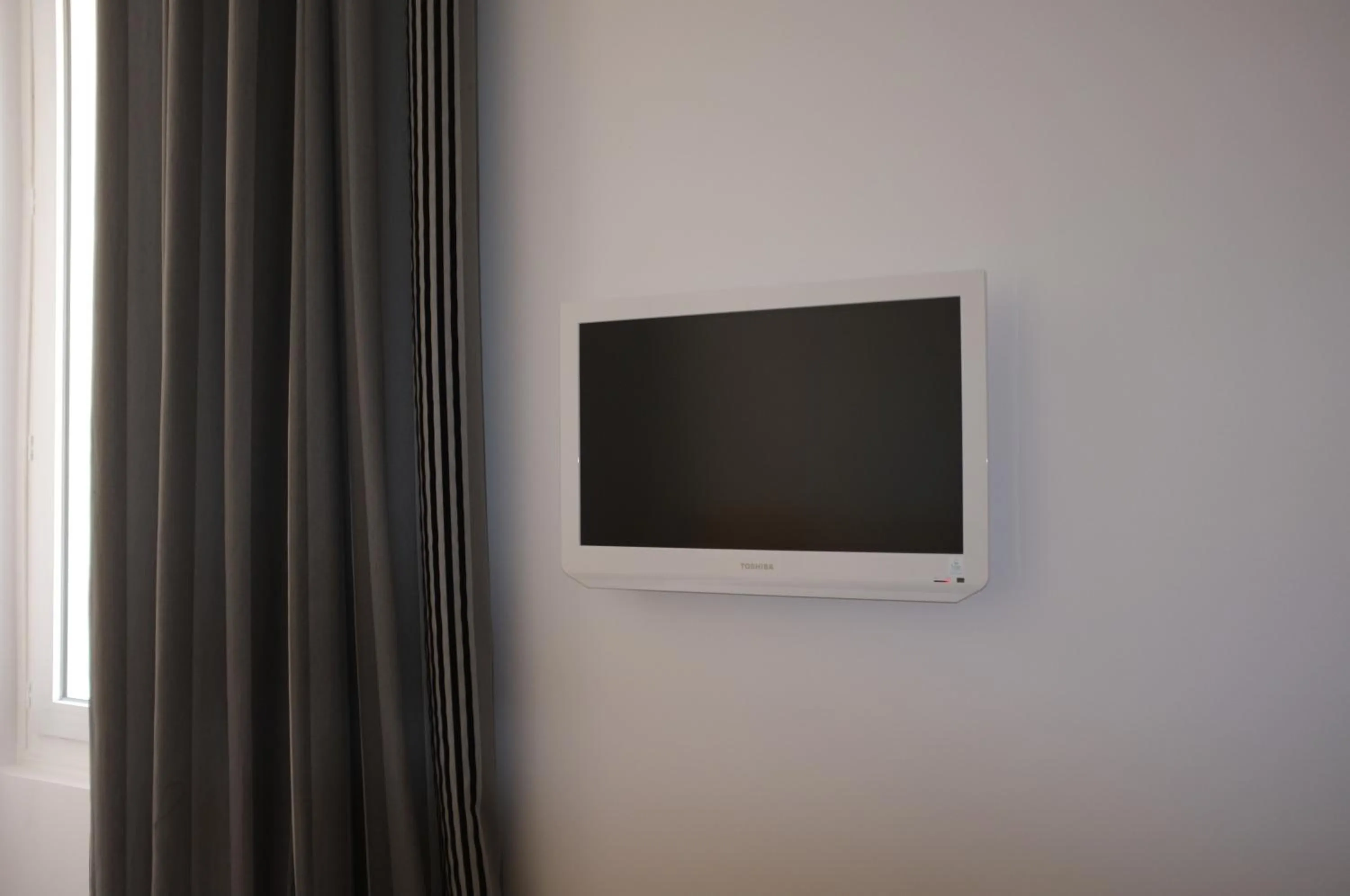 TV and multimedia in Hôtel Hermès