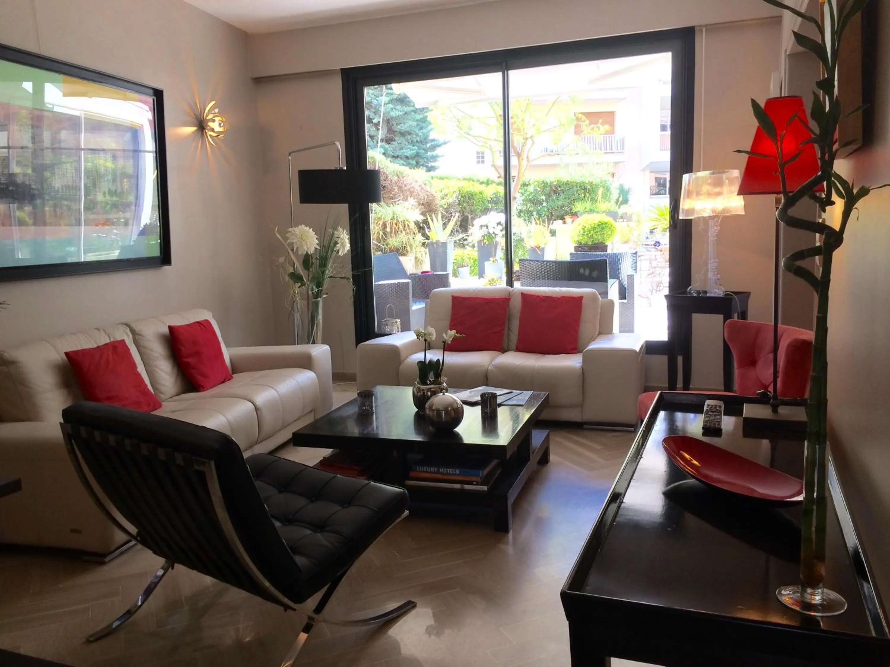 Communal lounge/ TV room in Logis Hotel Diana