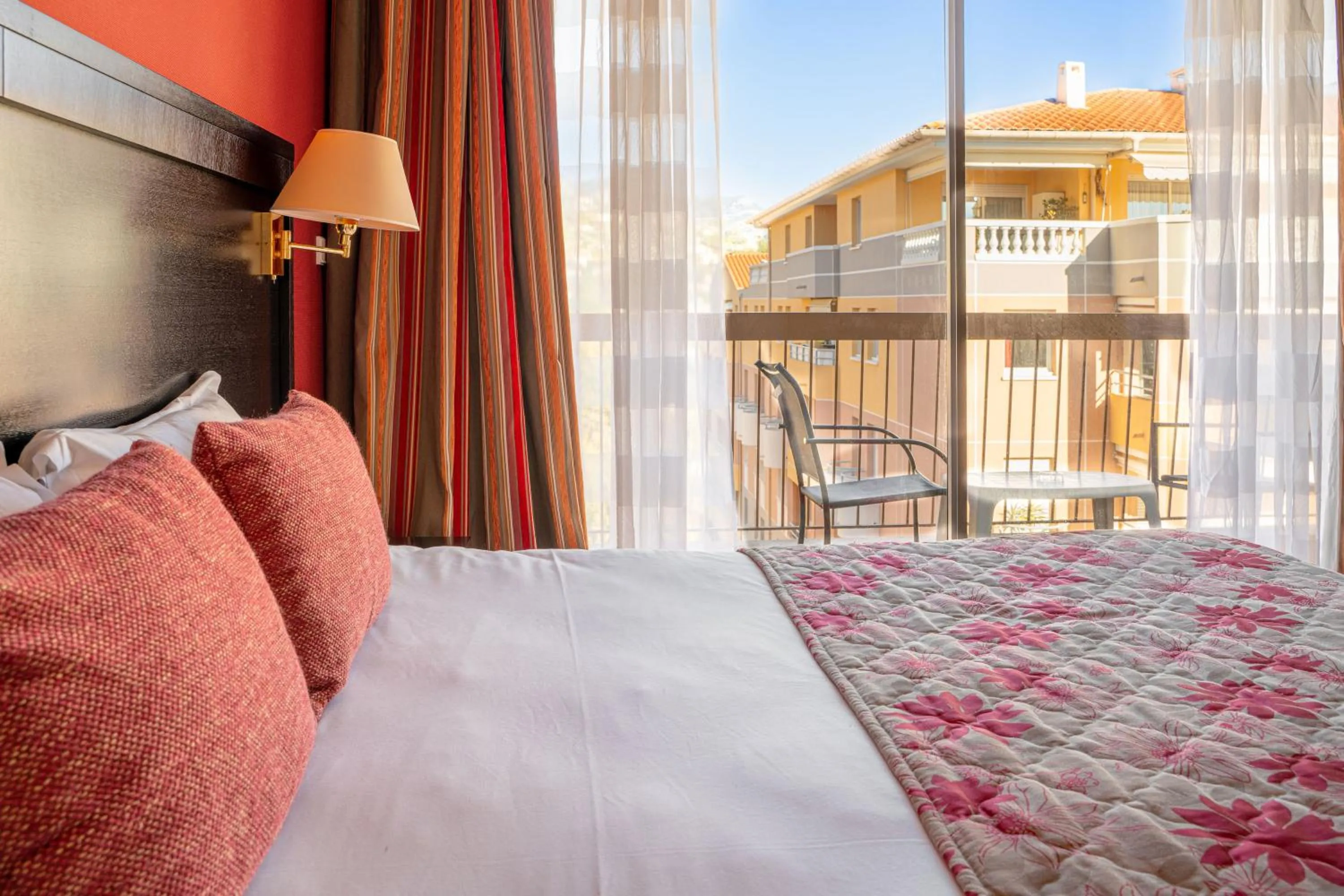 Bed in Logis Hotel Diana