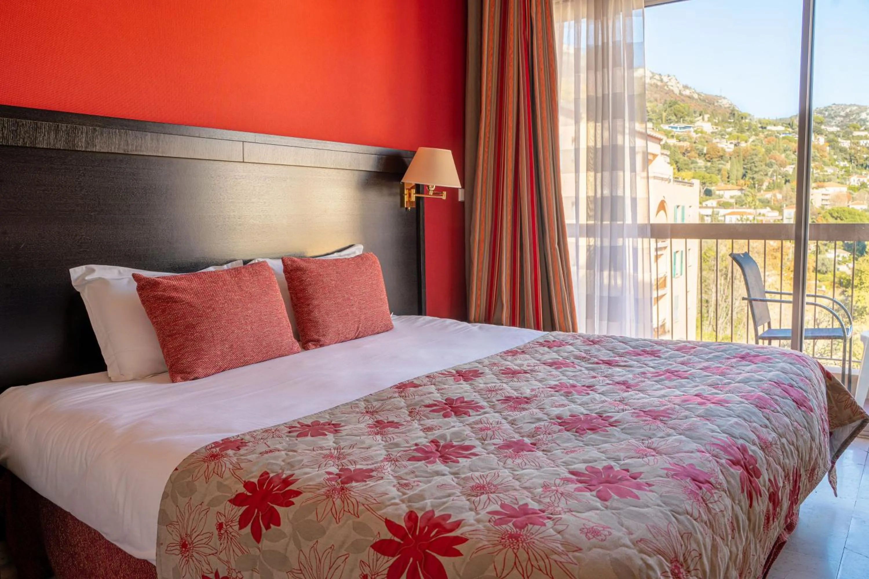 Bed in Logis Hotel Diana