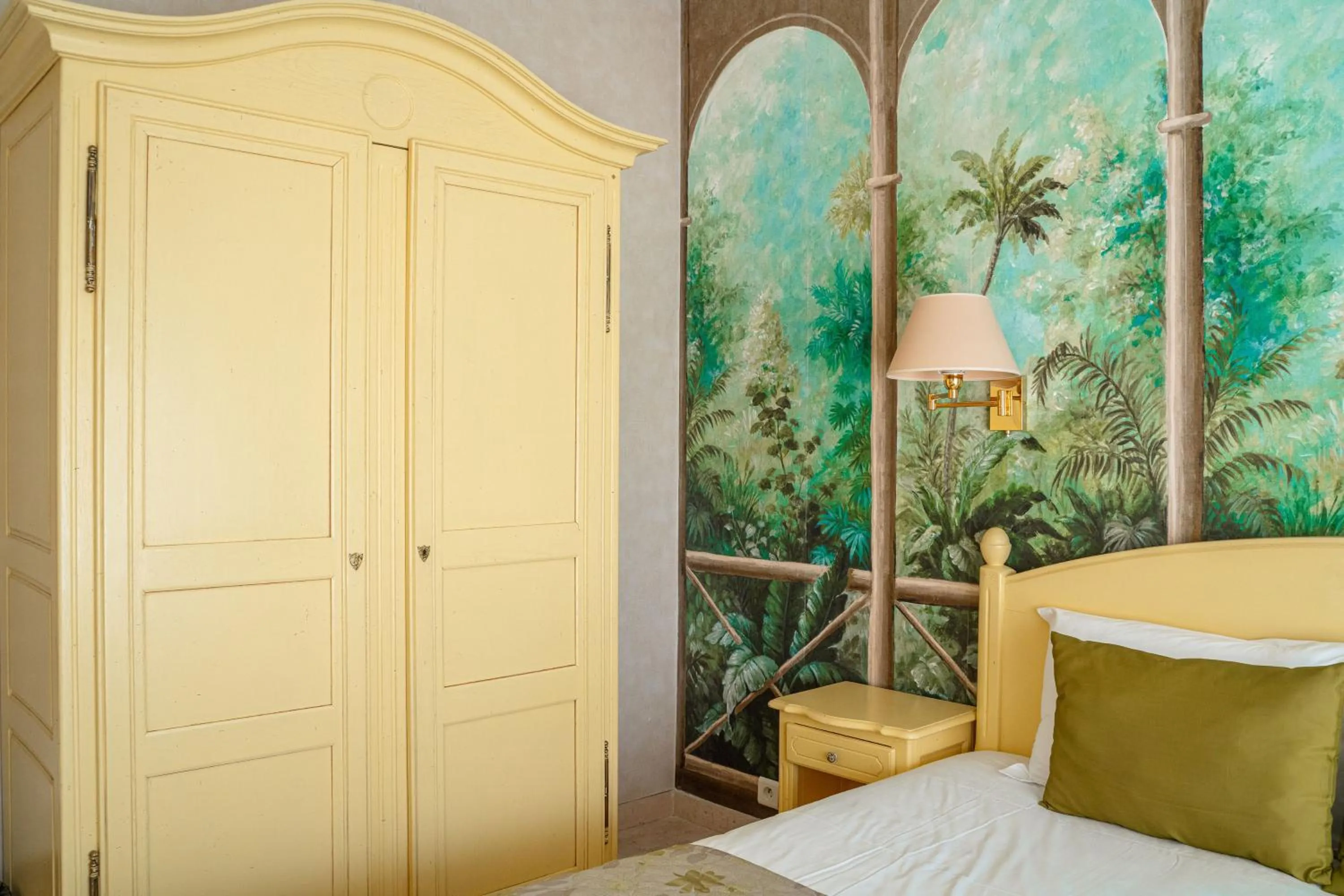 Bed in Logis Hotel Diana