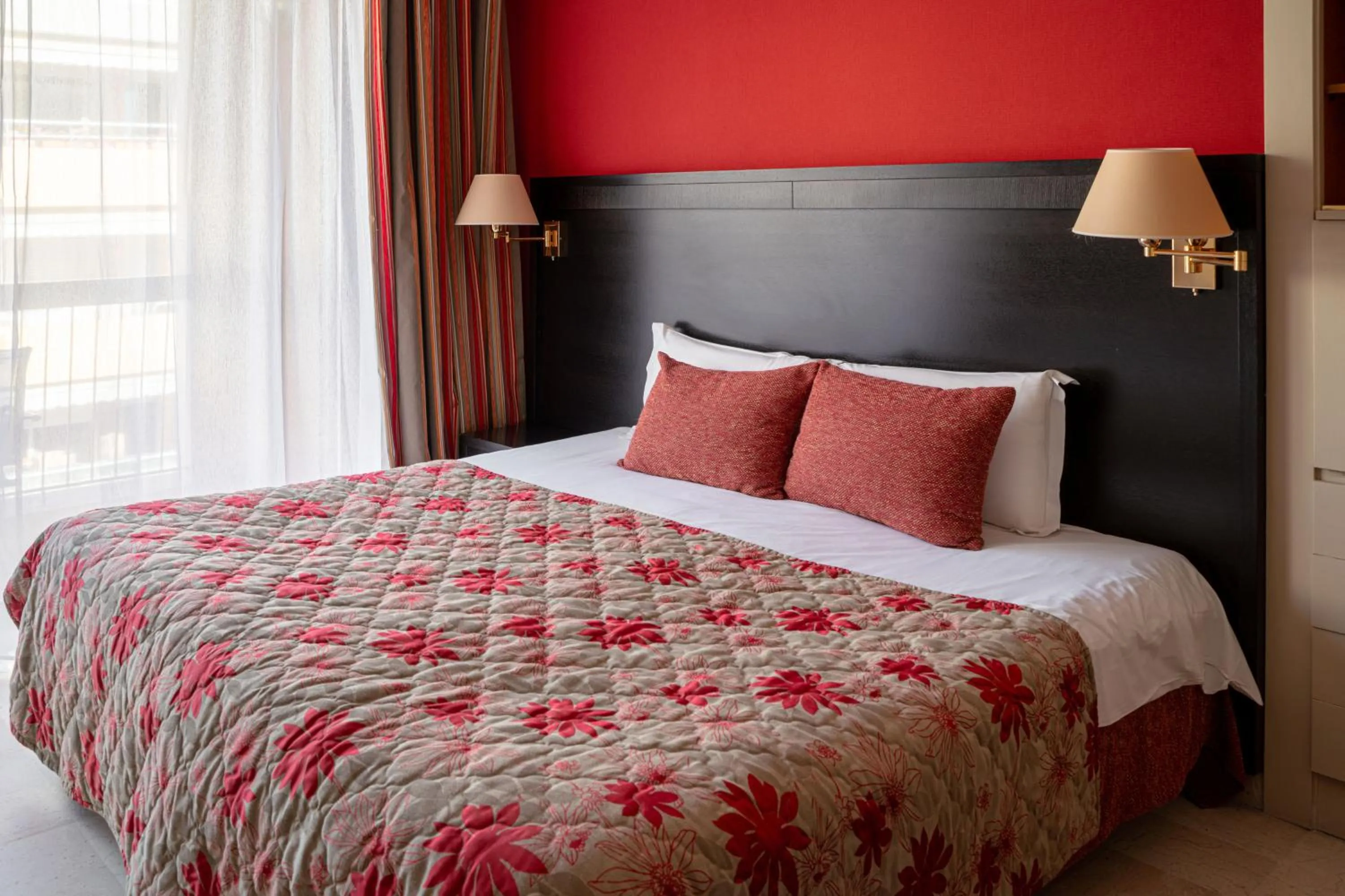 Bed in Logis Hotel Diana