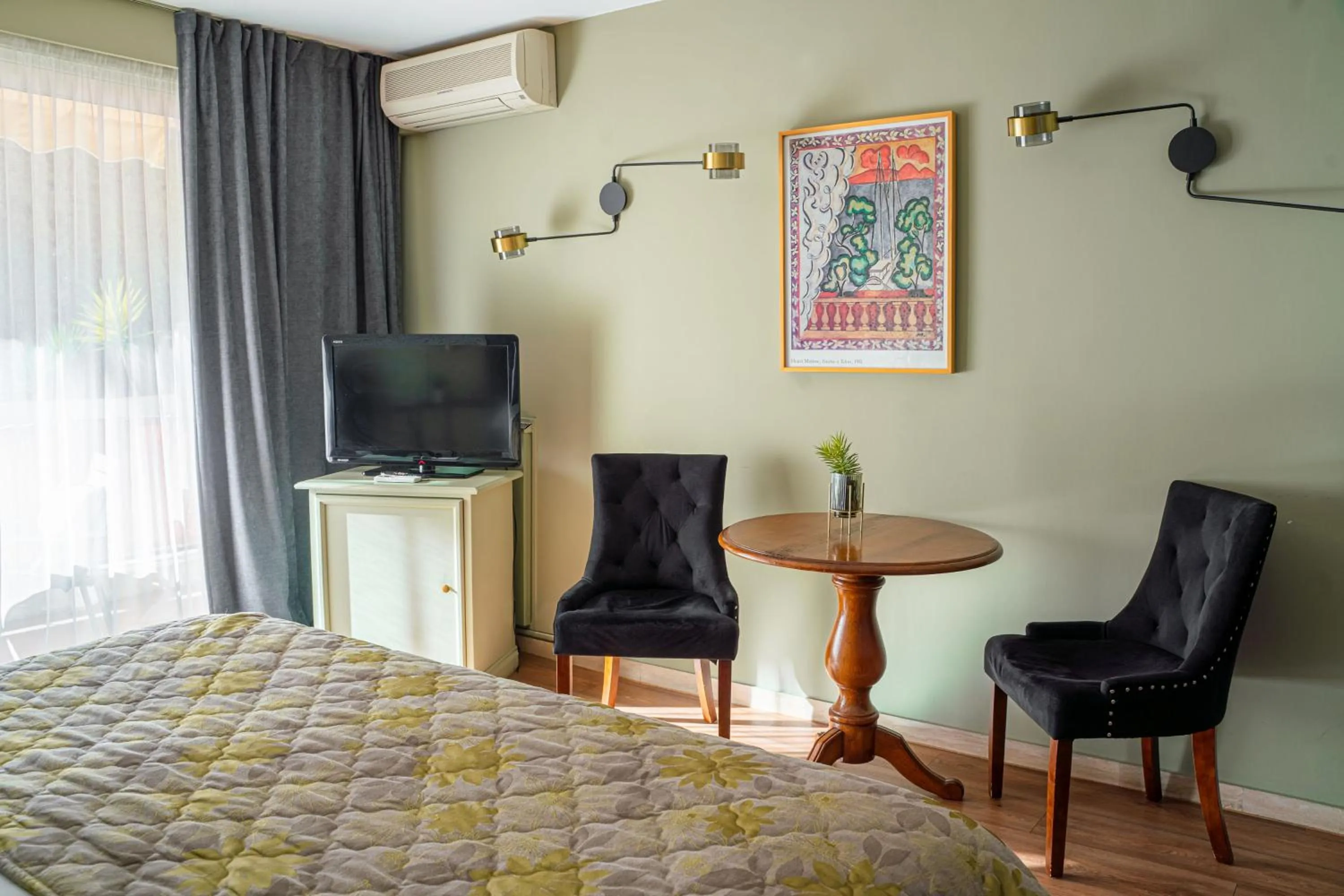 Bed in Logis Hotel Diana