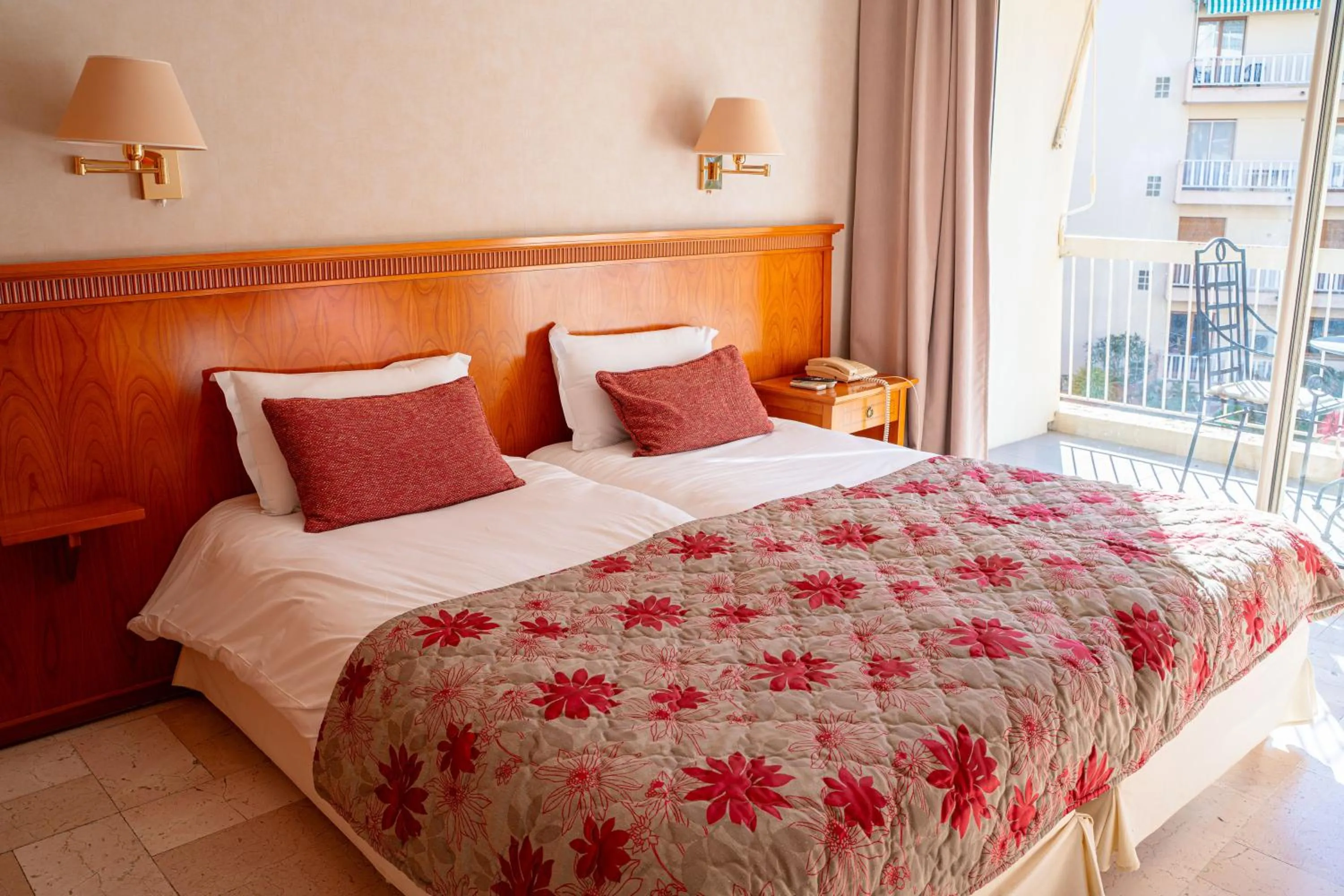 Bed in Logis Hotel Diana