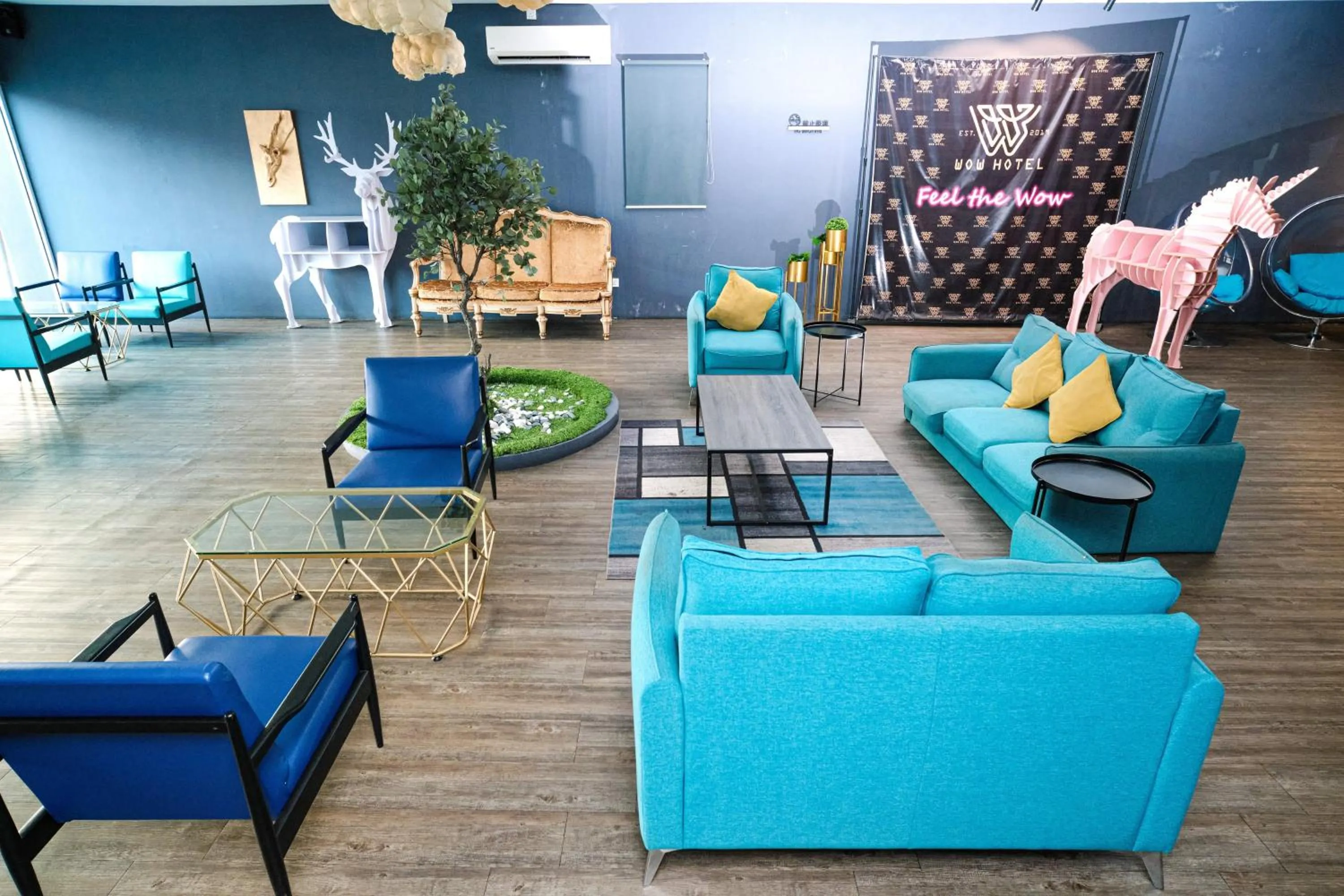 Seating area in Palette Georgetown Formerly WoW Hotel