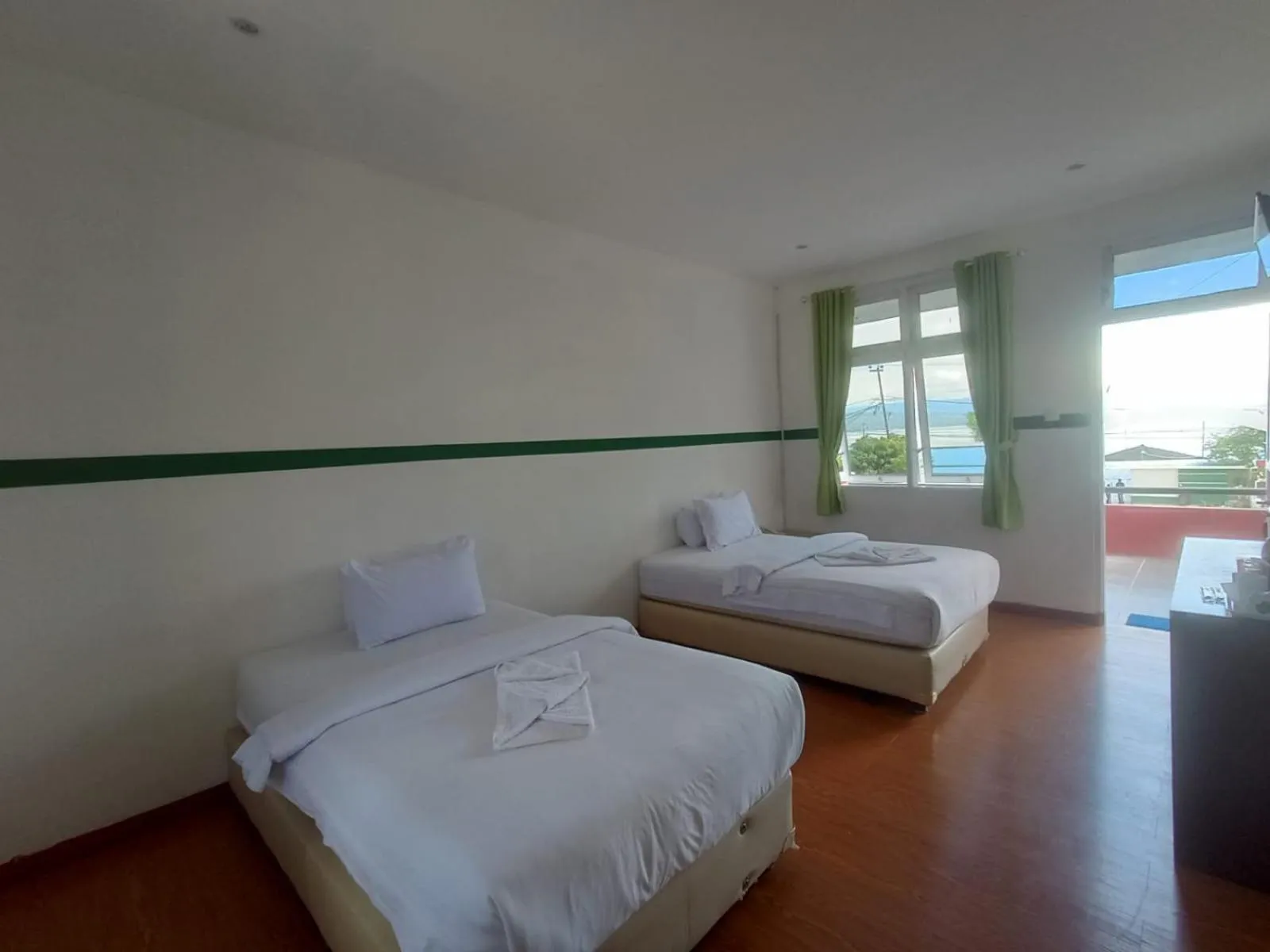 Bed in Hotel Ompu Herti