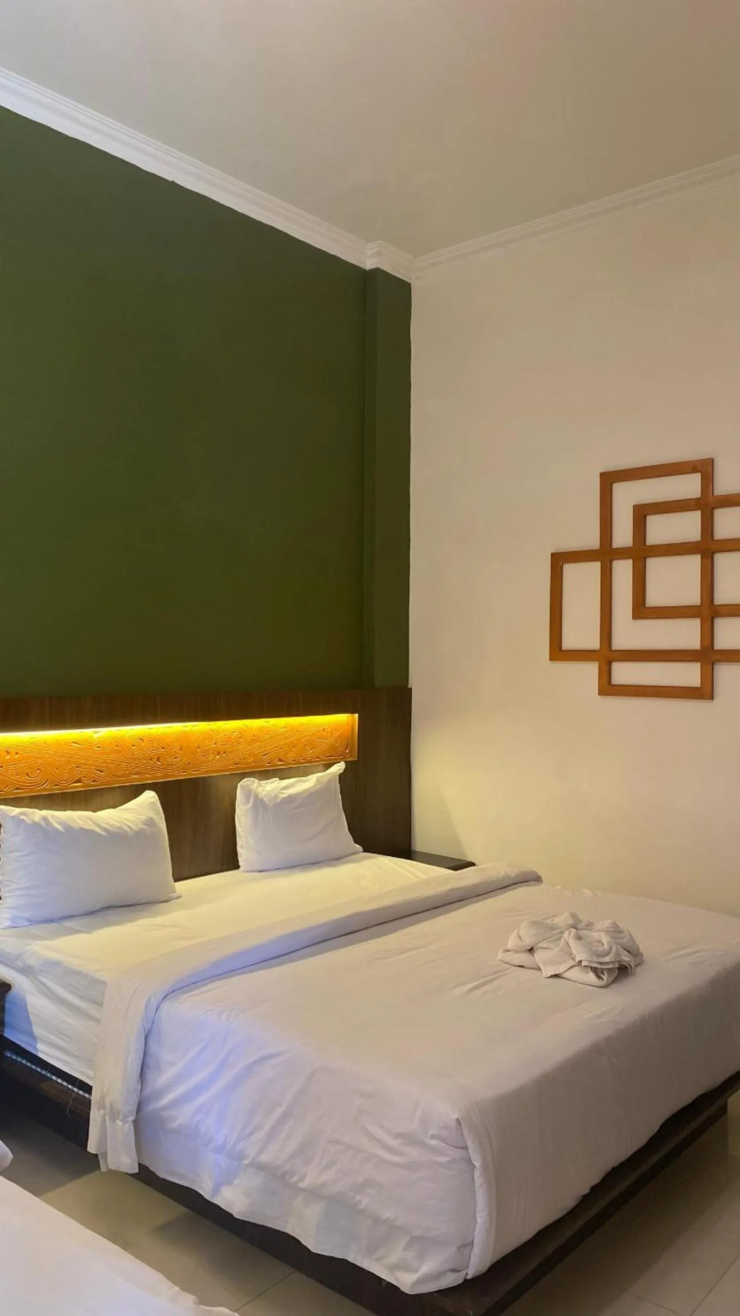 Bed in Hotel Ompu Herti