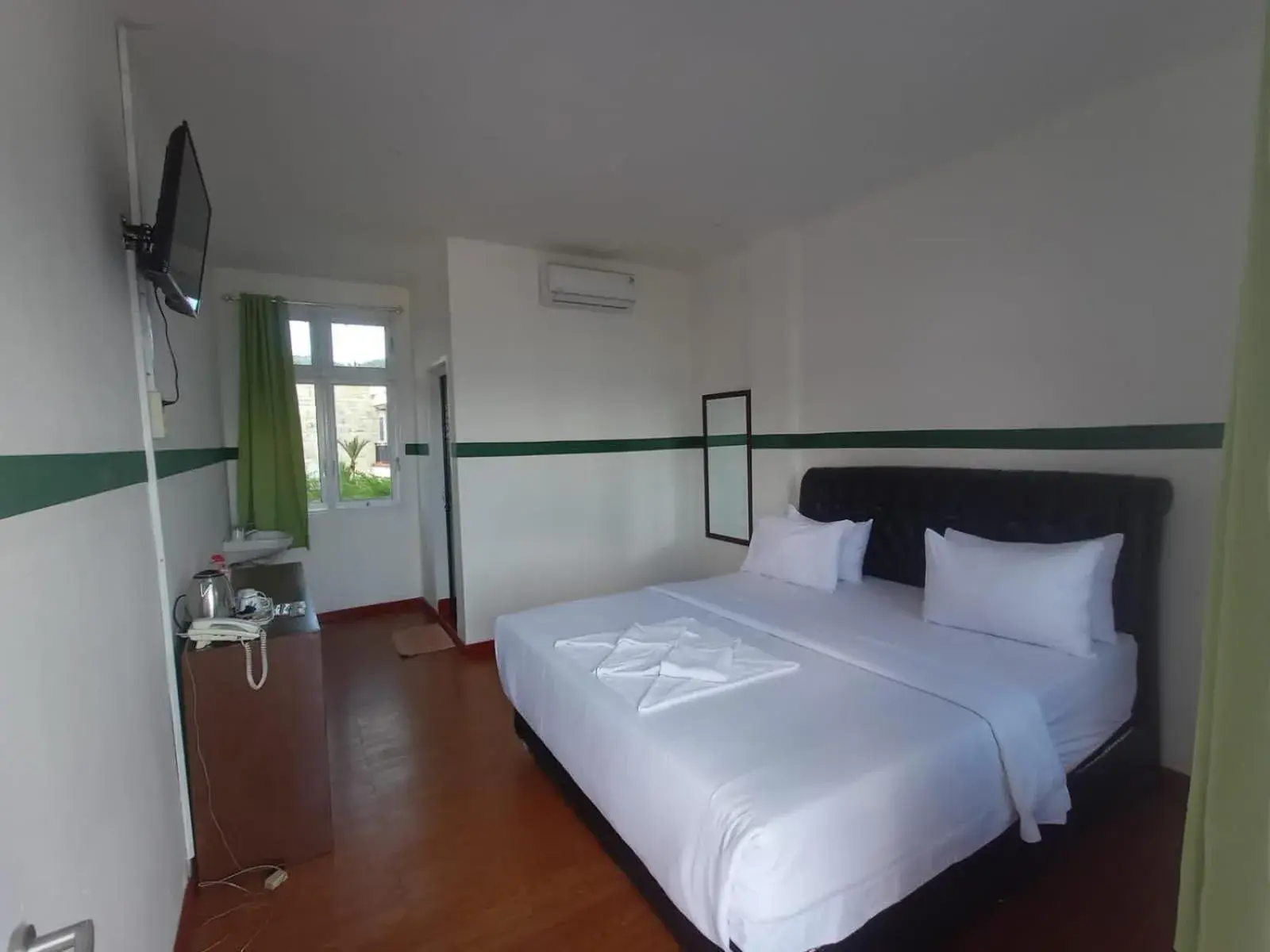 Bed in Hotel Ompu Herti Bed in Hotel Ompu Herti