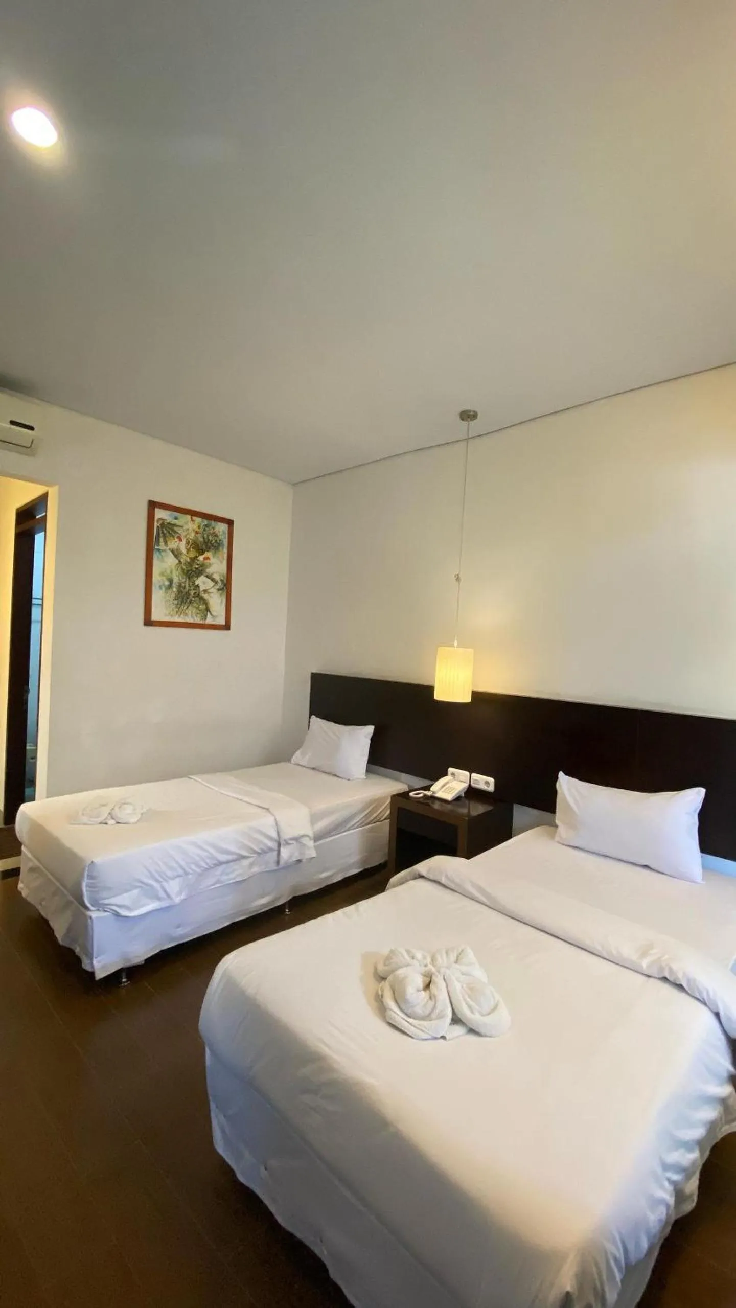 Bed in Hotel Ompu Herti