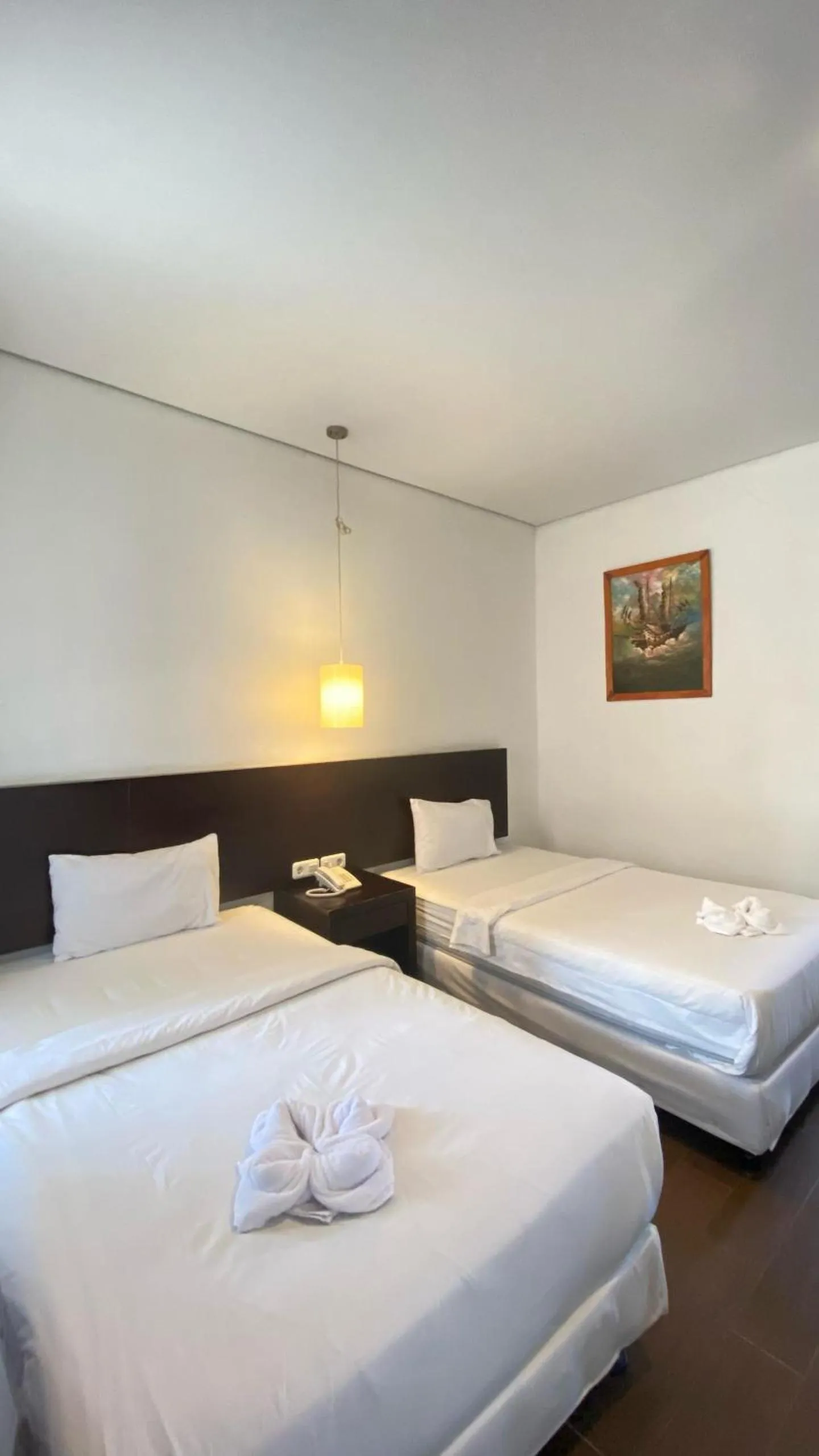 Bed in Hotel Ompu Herti