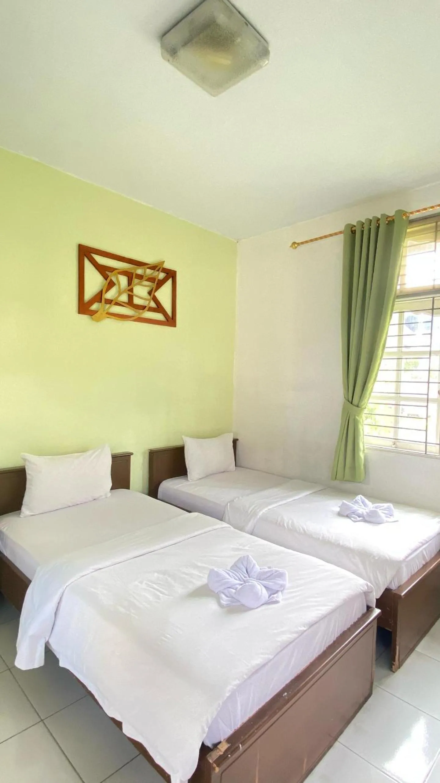 Bed in Hotel Ompu Herti