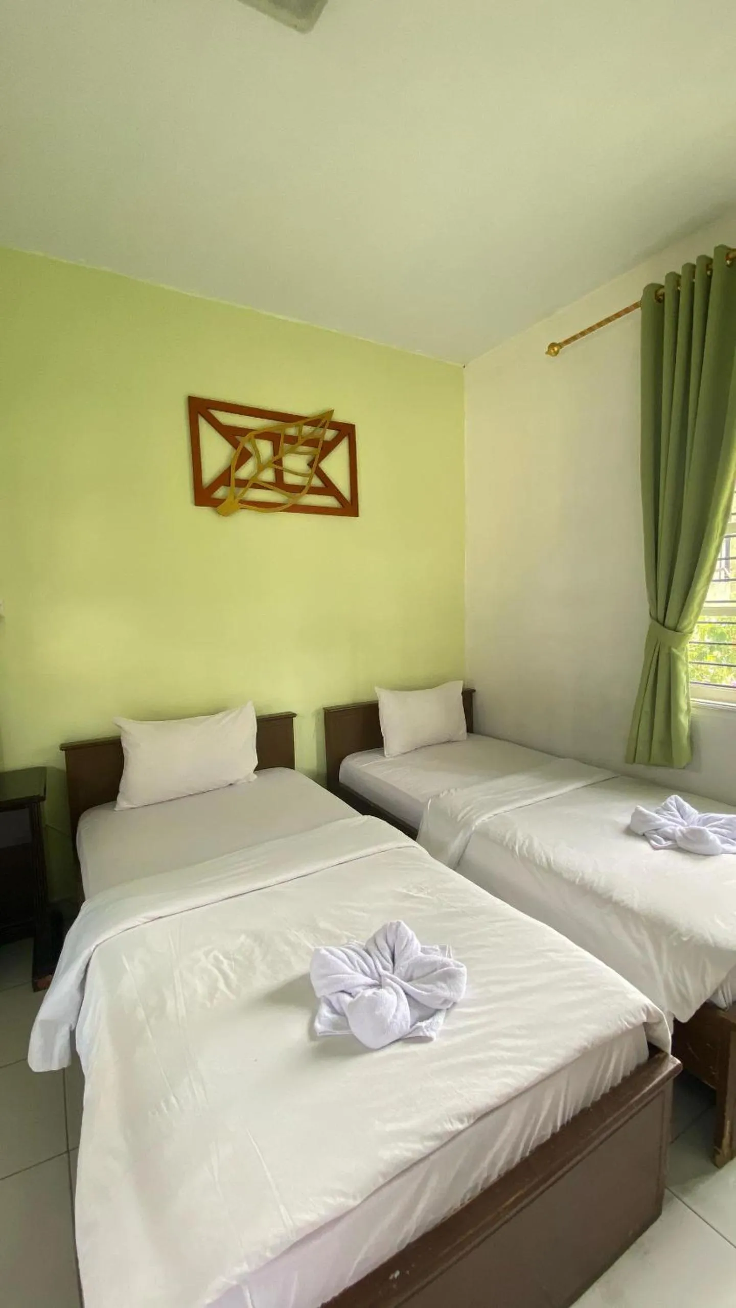 Bed in Hotel Ompu Herti