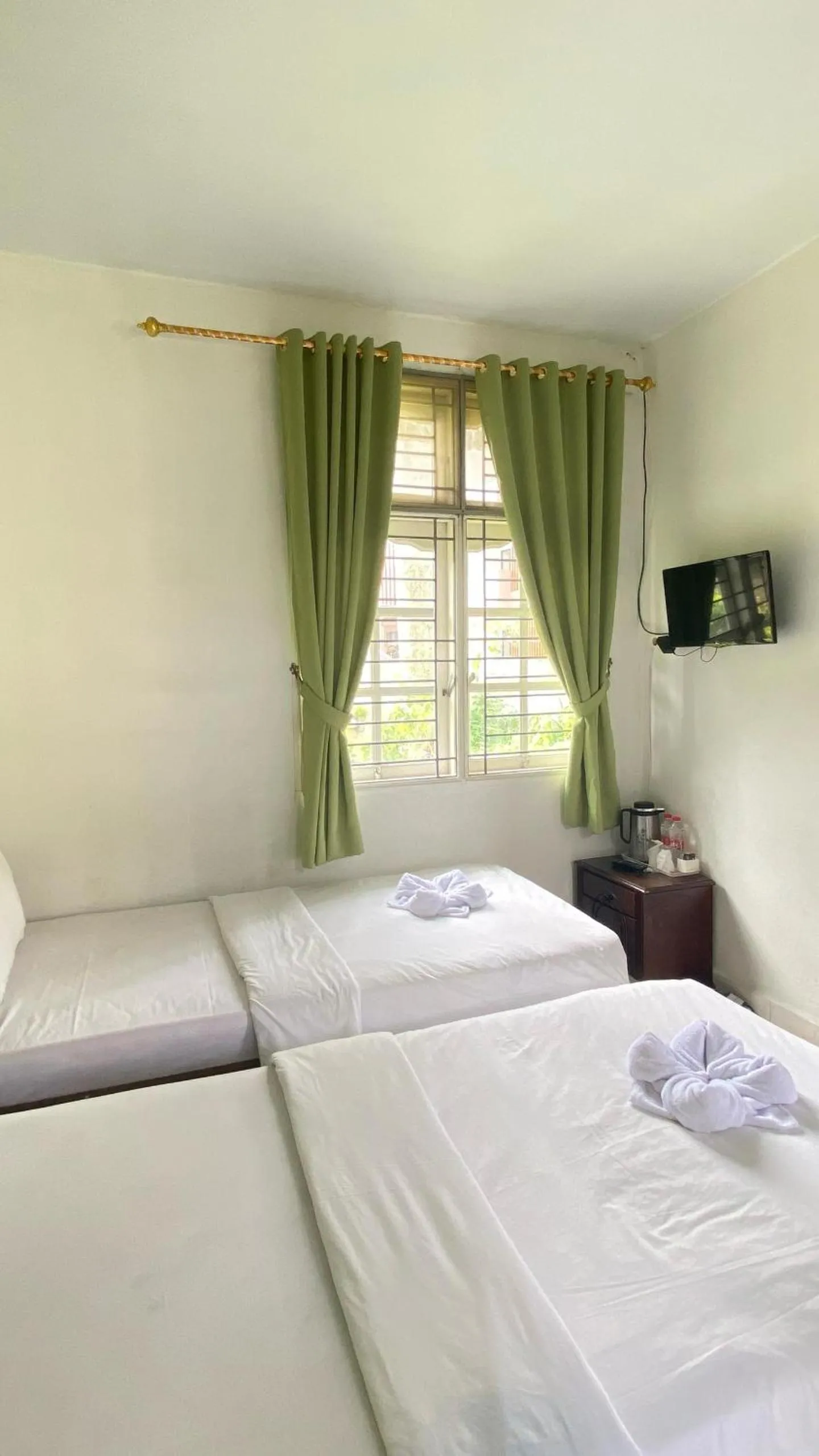 Bed in Hotel Ompu Herti