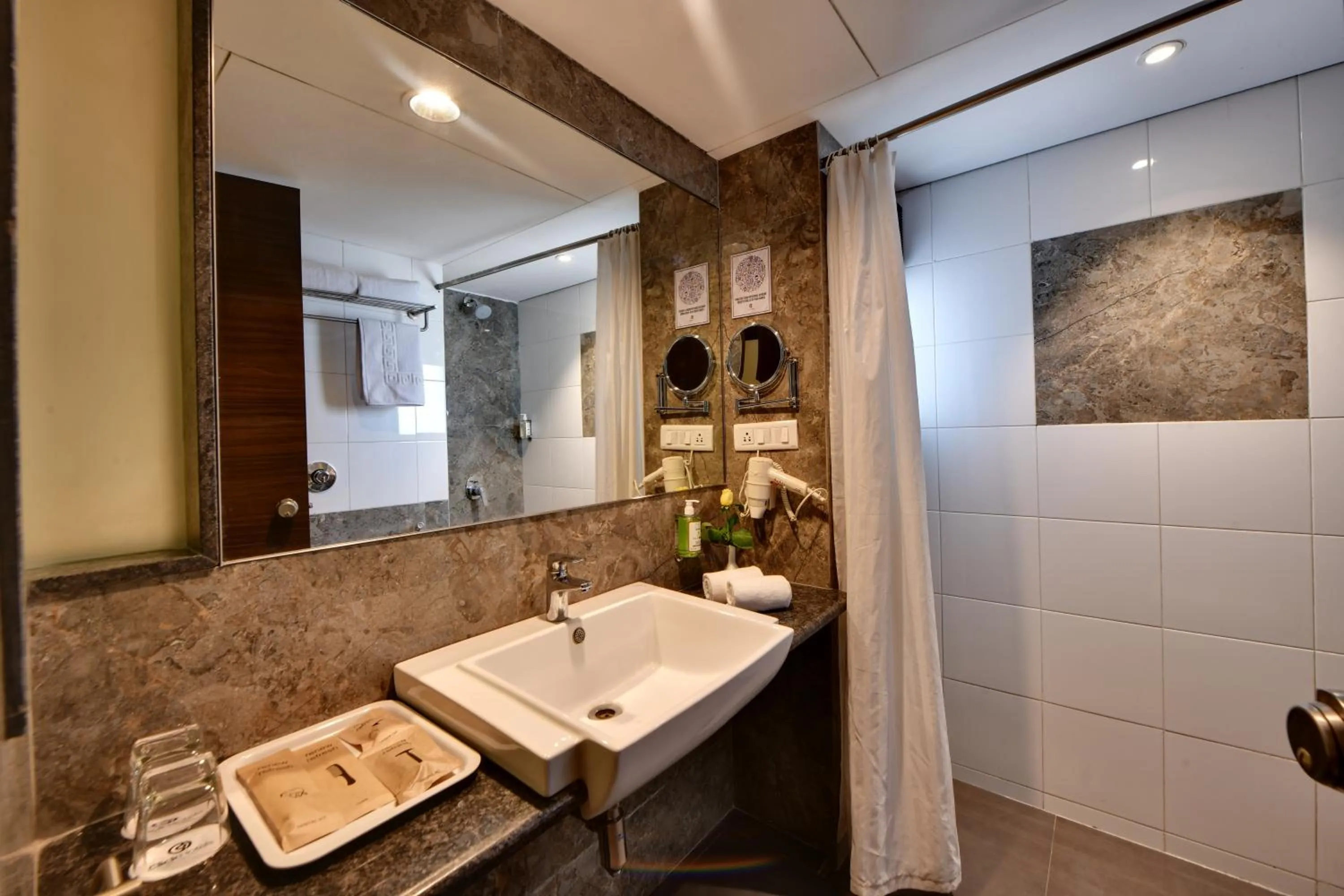 Bathroom in Click Hotel Vadodara 4 mins walk for the Railway Station