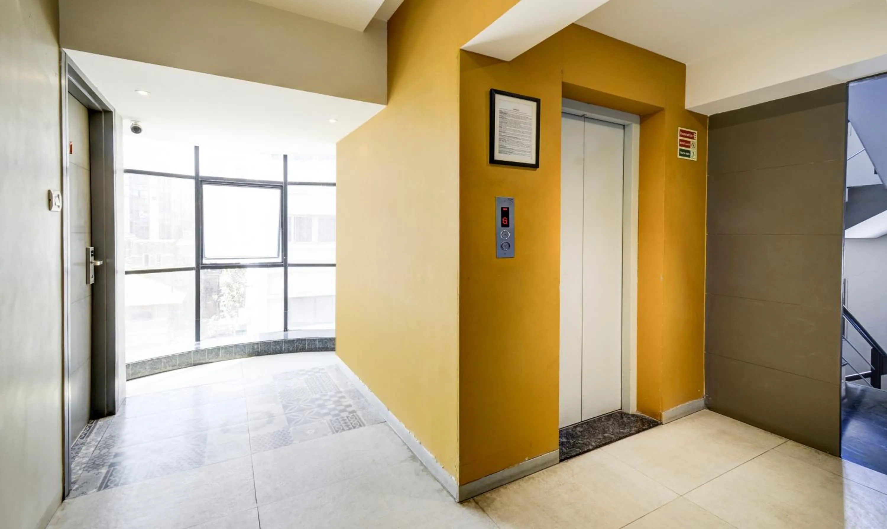 elevator in Click Hotel Vadodara 4 mins walk for the Railway Station