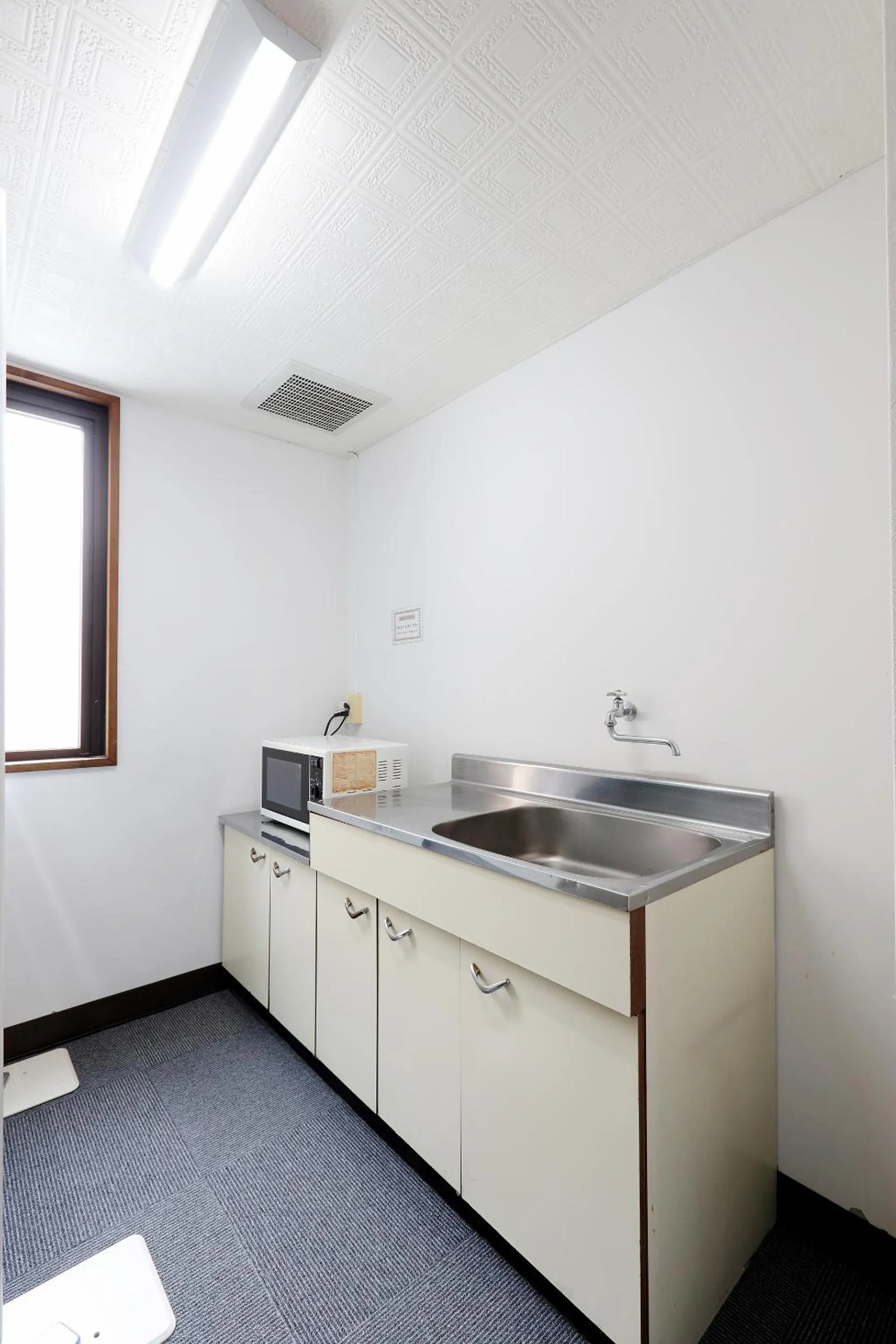 Kitchen or kitchenette in Tabist Rays Hotel Suisen