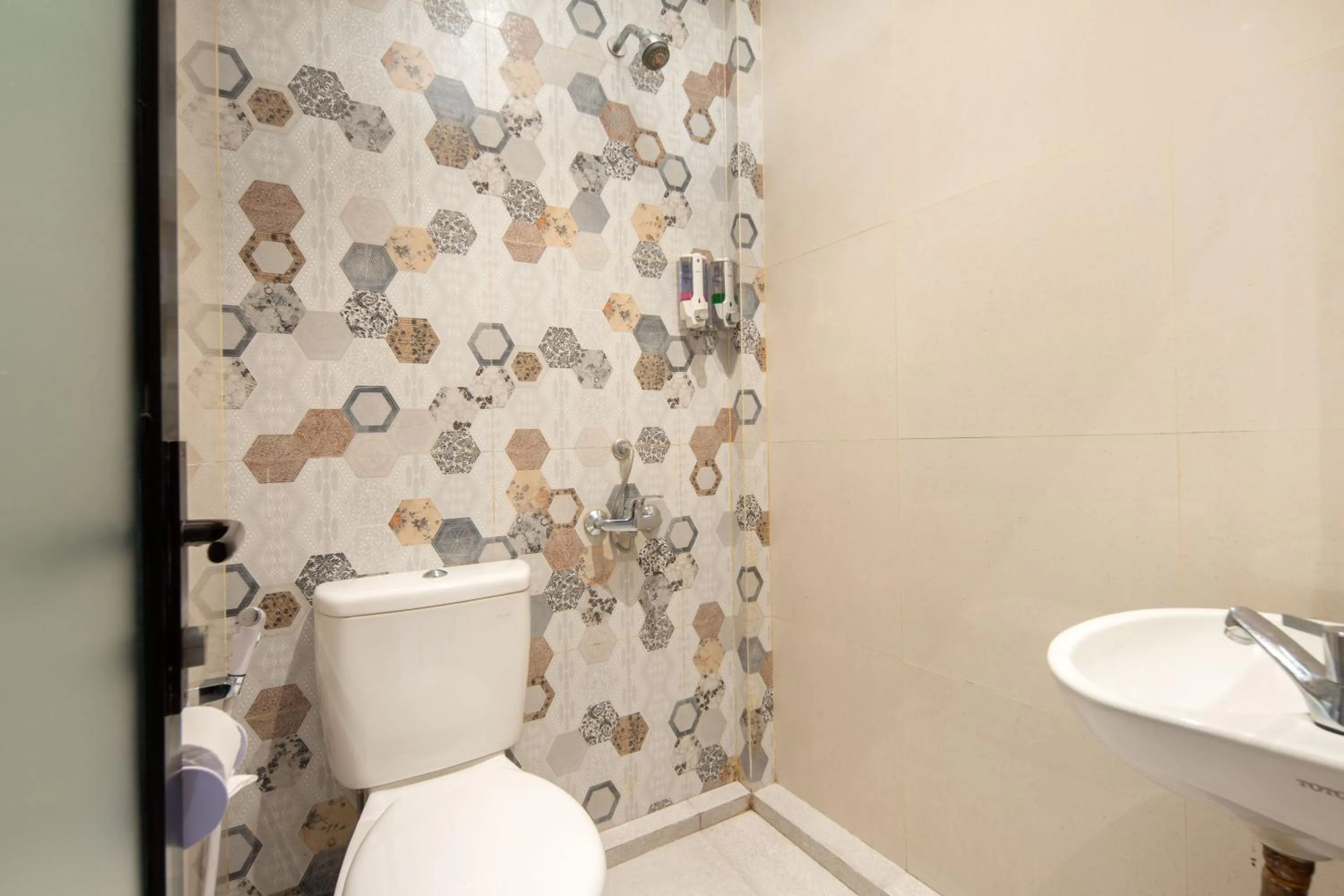 Bathroom in Angkul Angkul Segara Beach Kuta by Kamara