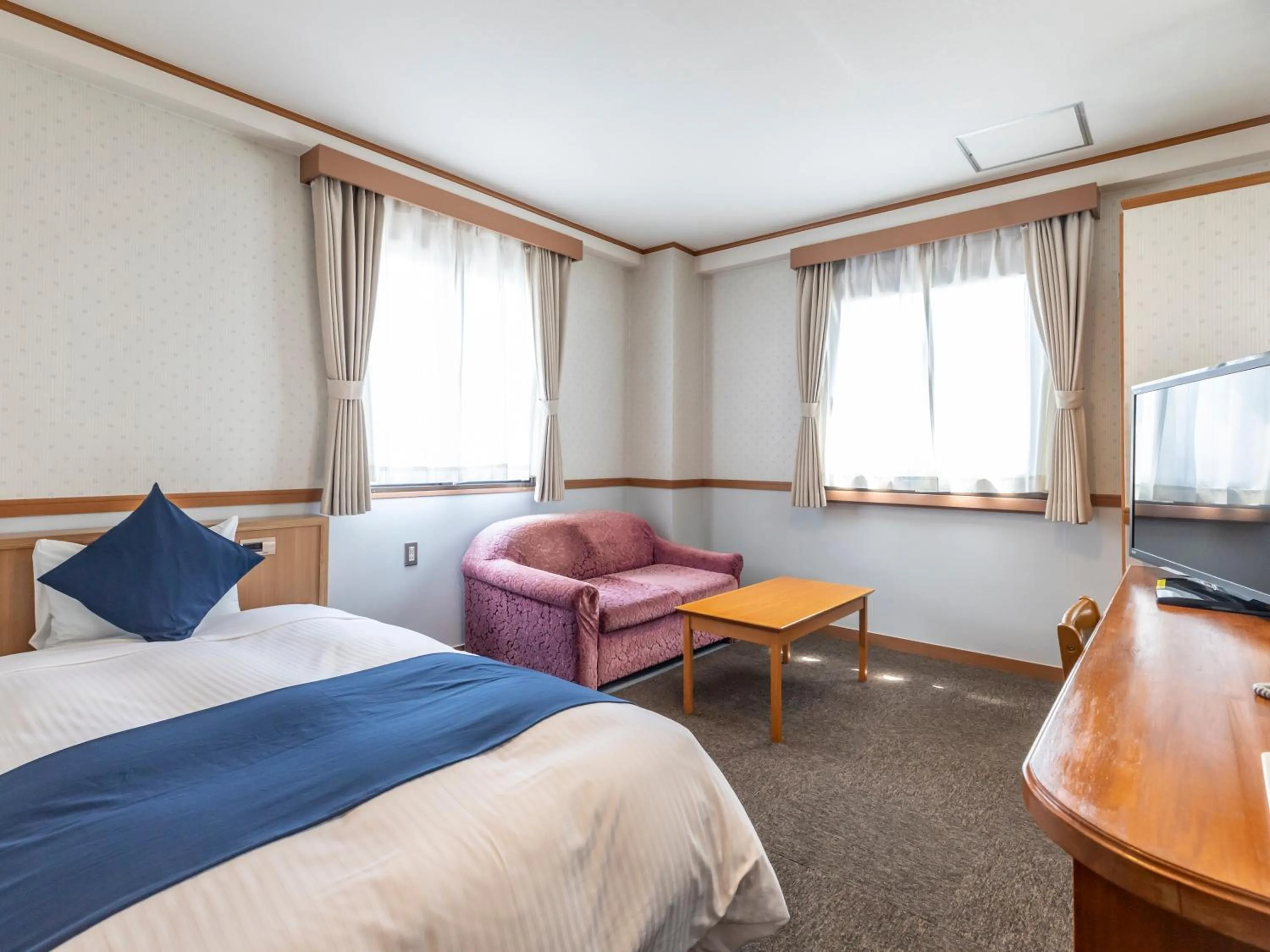 Bed in Tabist Asa Station Hotel