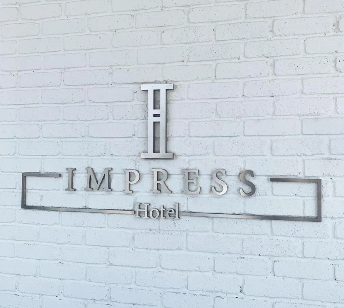 IMPRESS HOTEL