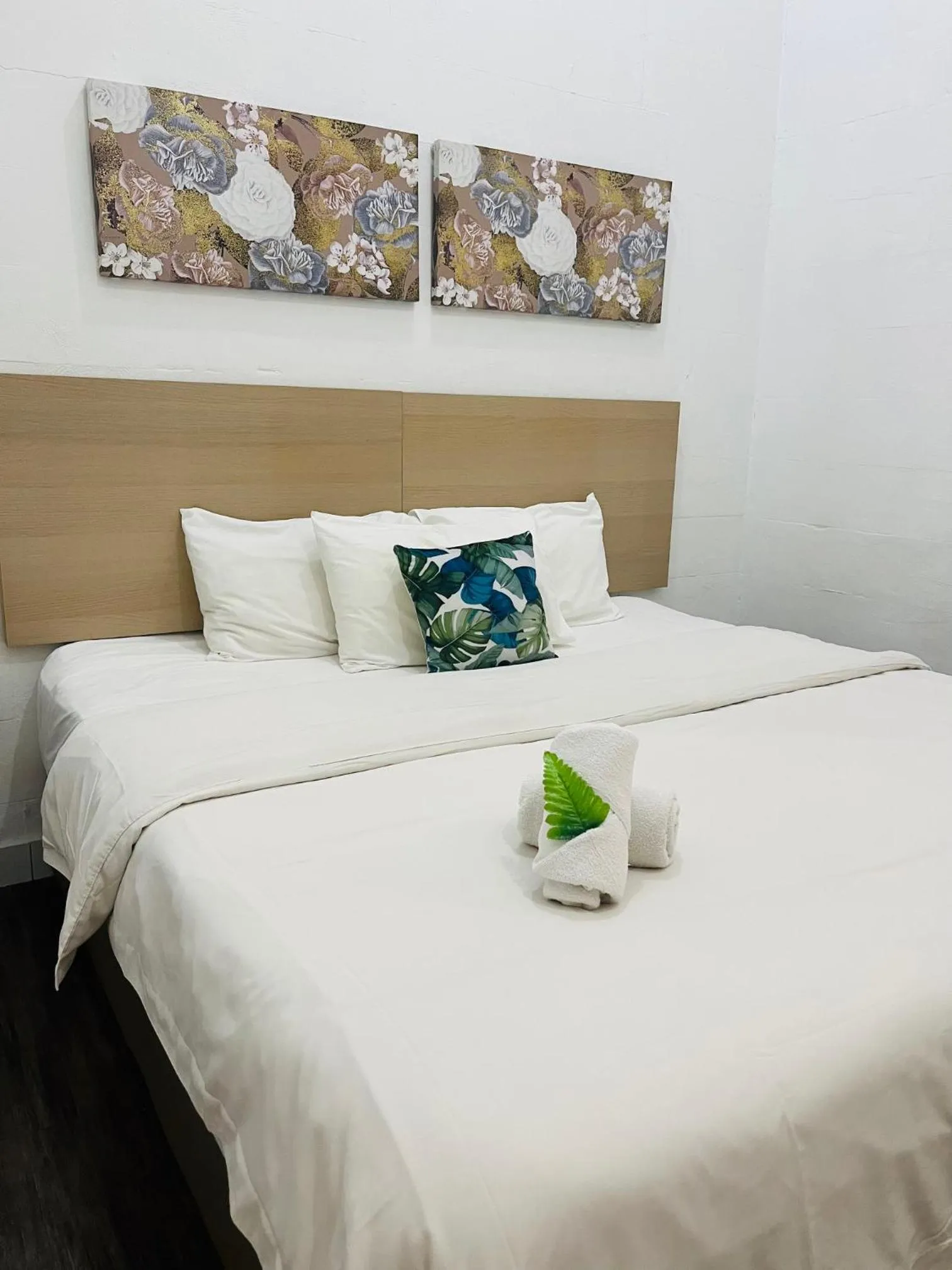 Bed in IMPRESS HOTEL