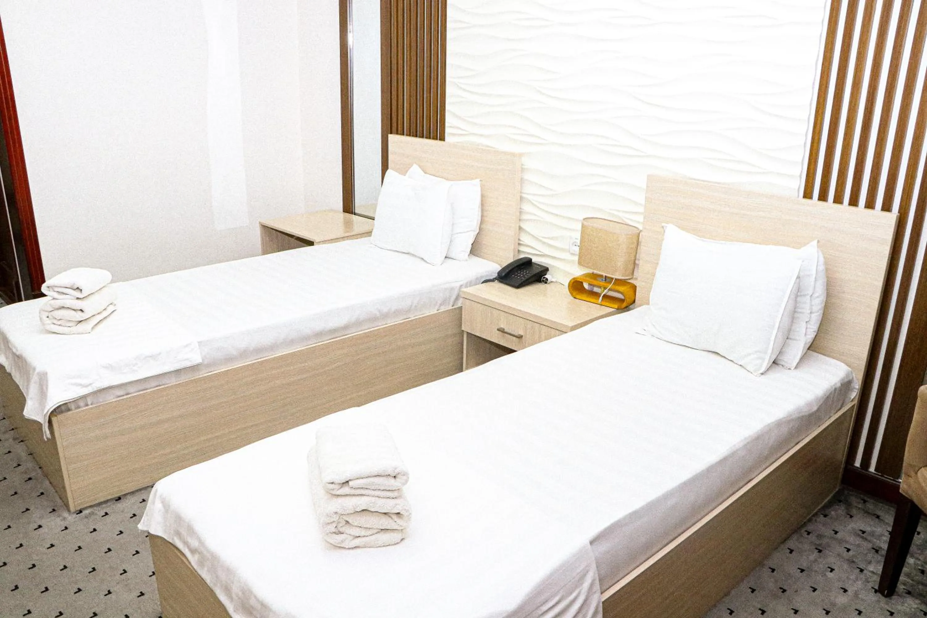Bed in ORZU HOTEL