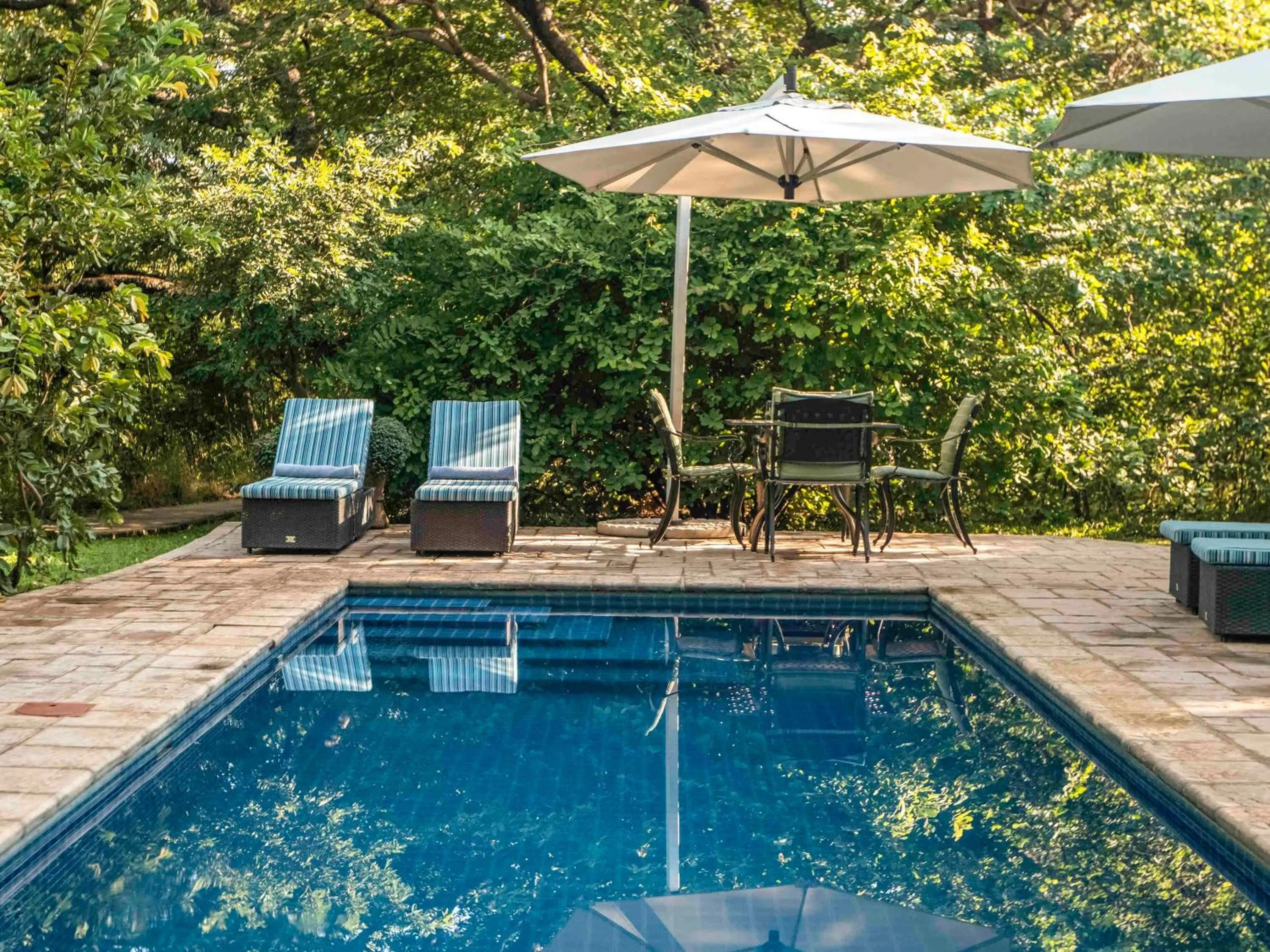 Pool view in Mbano Manor Hotel Victoria Falls